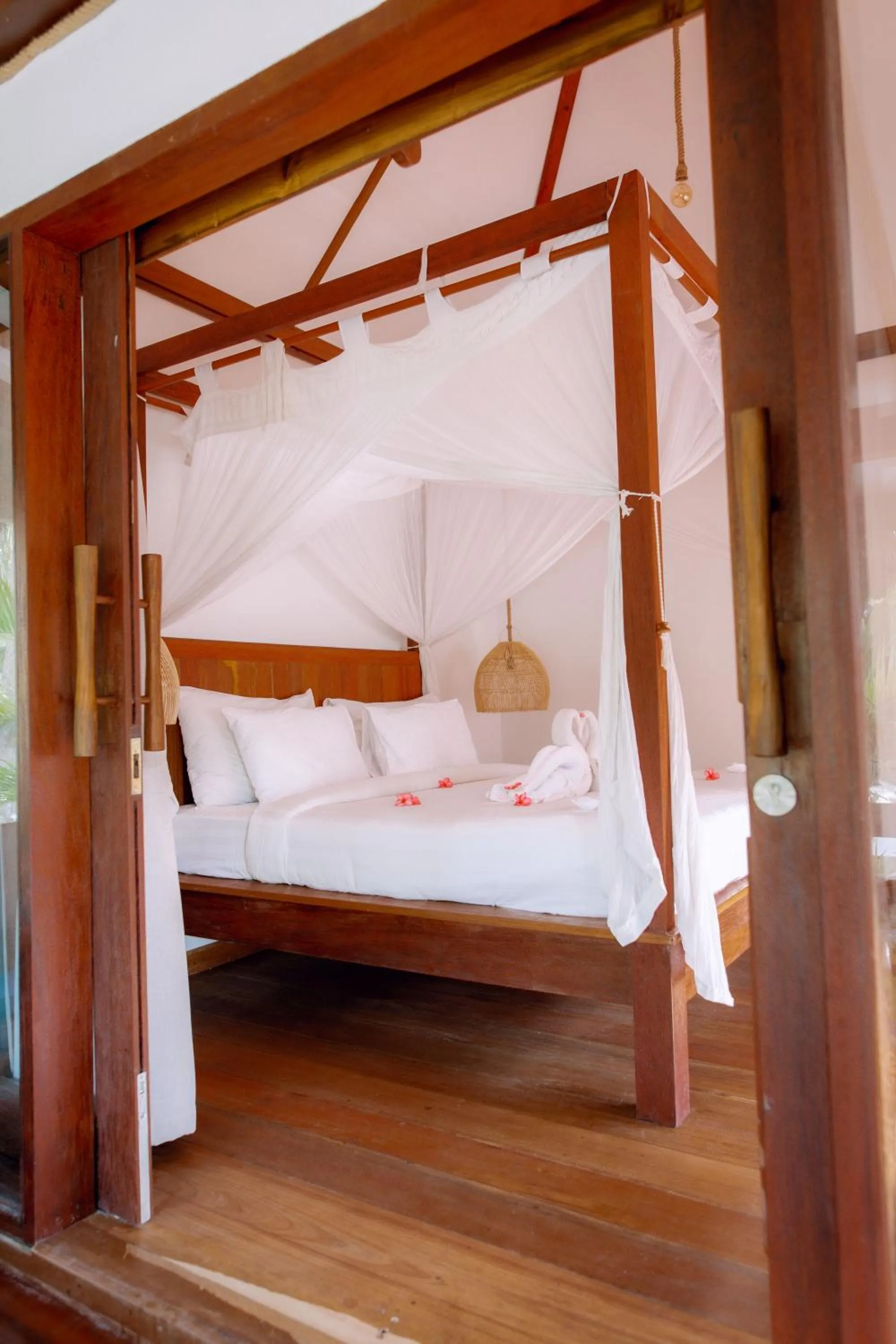 Bed in Island View Bar & Bungalow