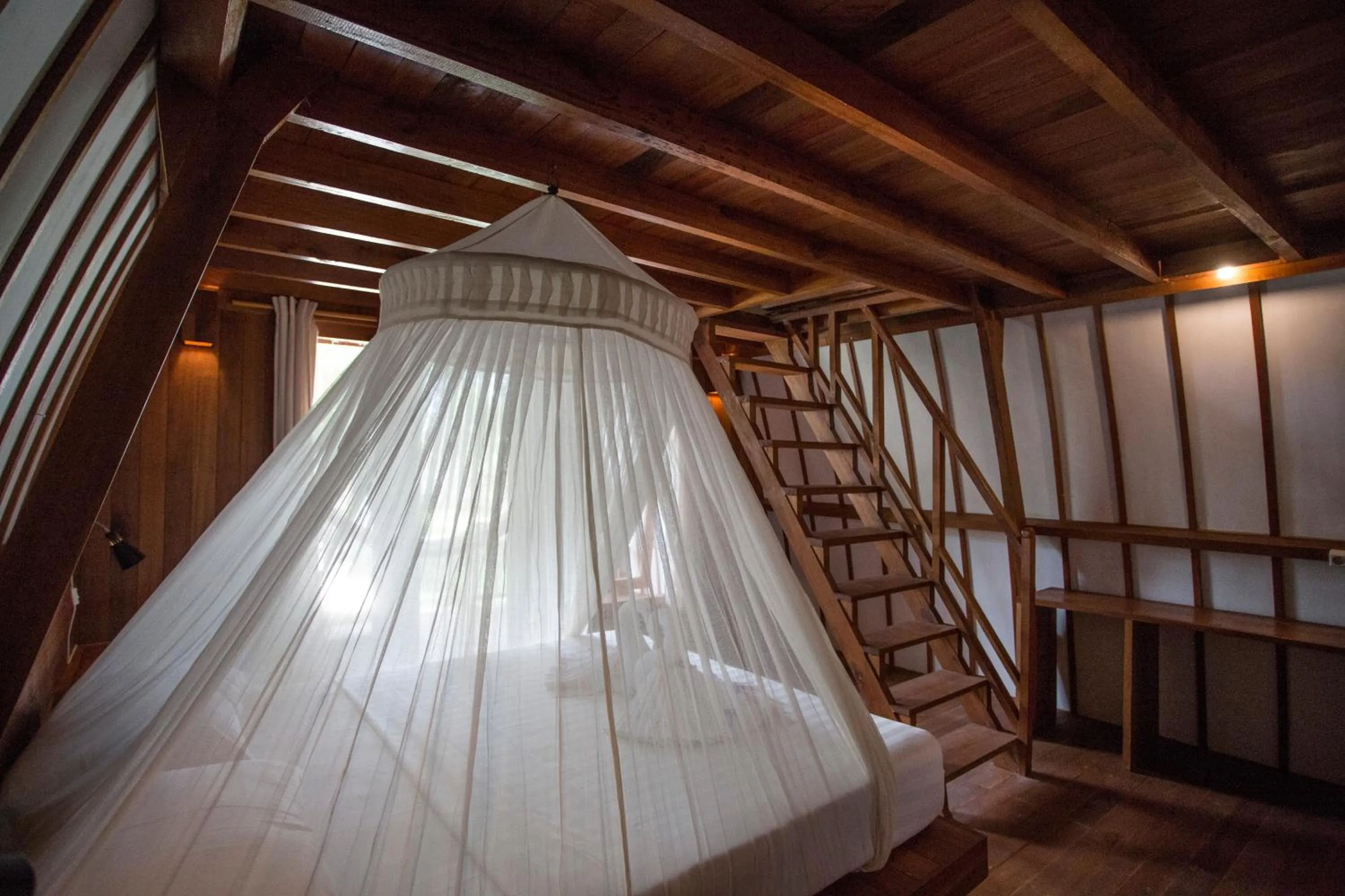 Bed in Island View Bar & Bungalow