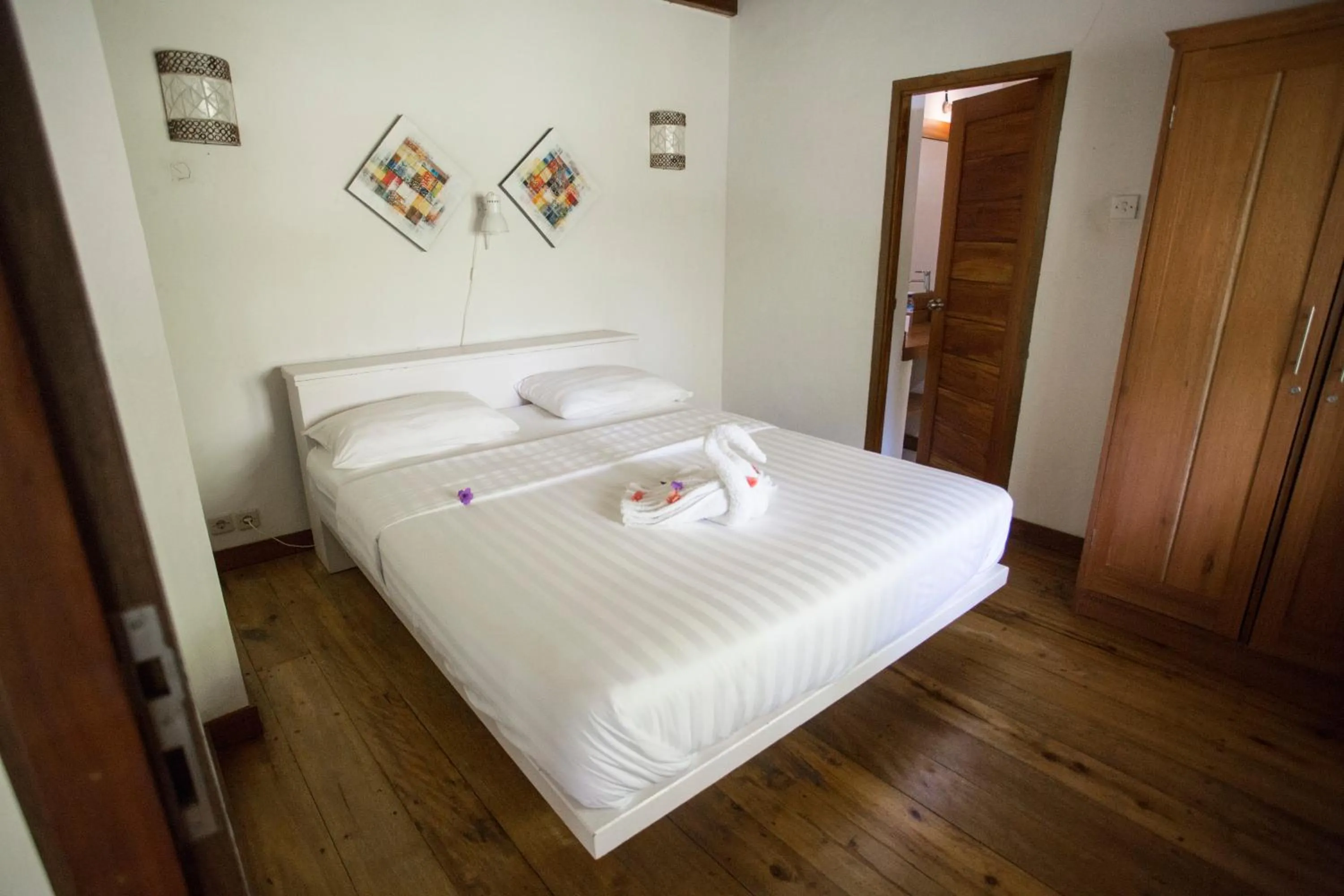 Bed in Island View Bar & Bungalow