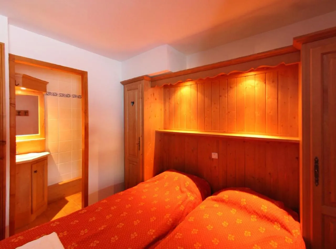 Bed in Chalet des Neiges Oz en Oisans
