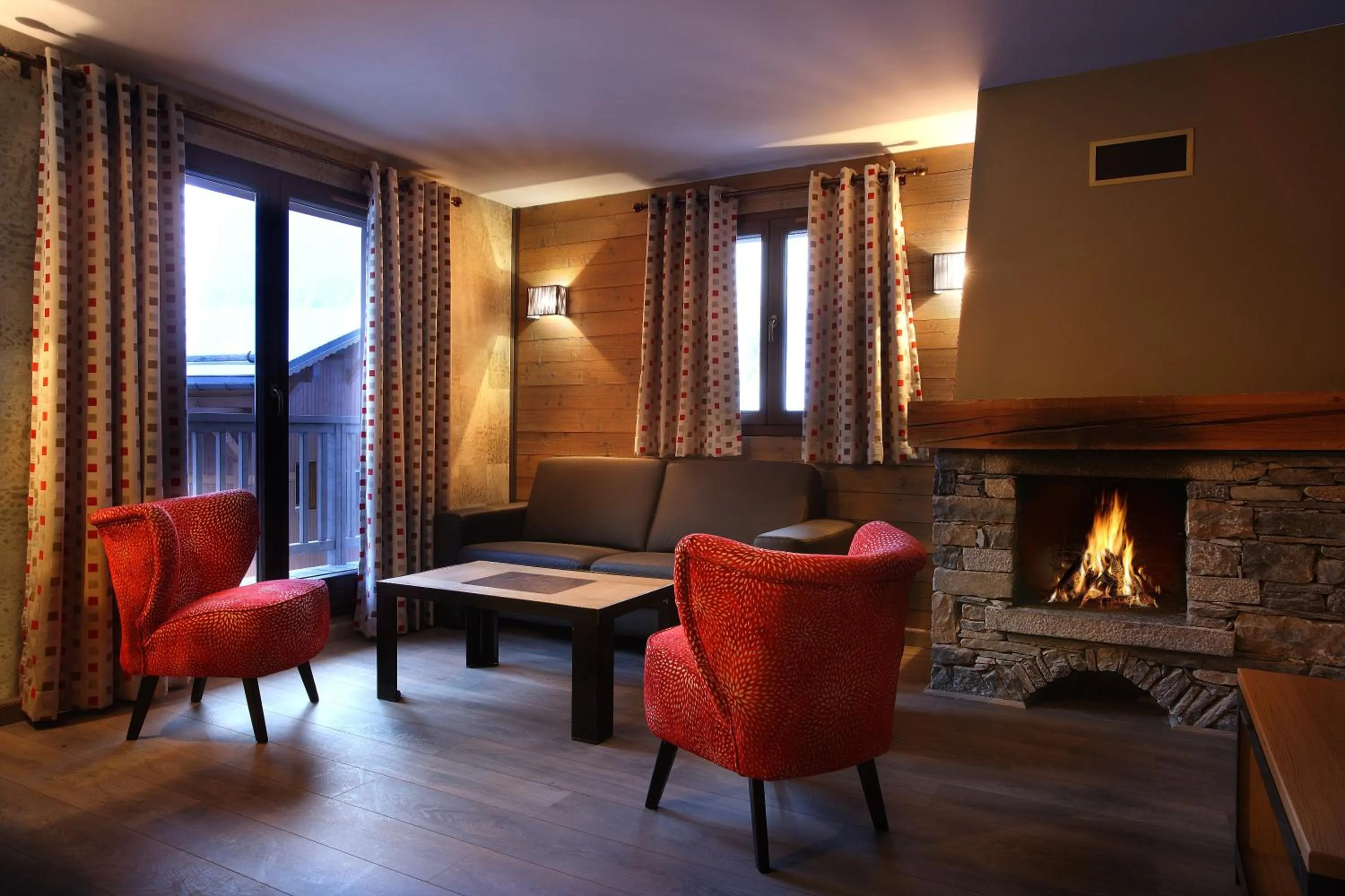 Communal lounge/ TV room in Résidence Les Arolles by Les Etincelles