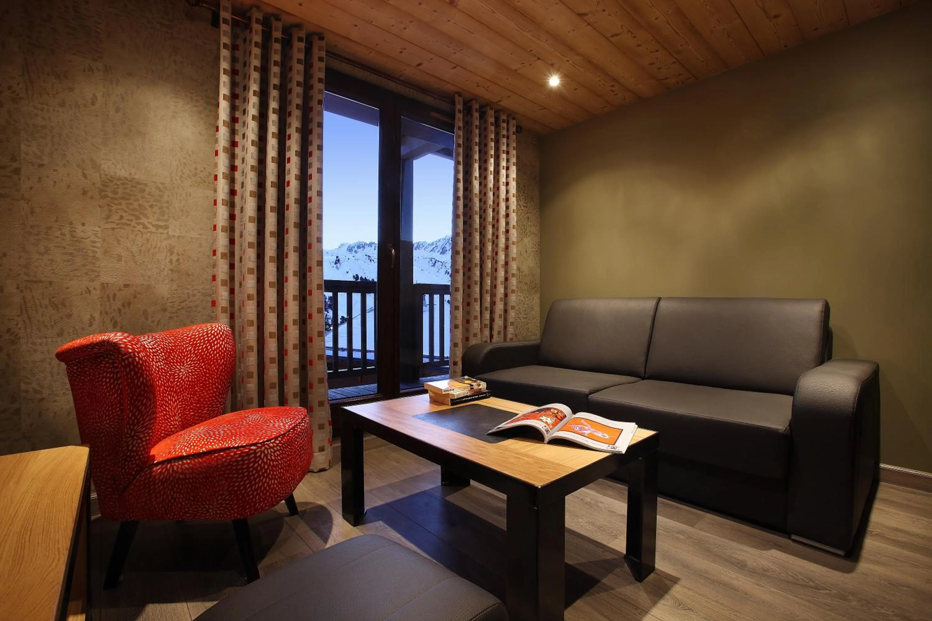 Living room in Résidence Les Arolles by Les Etincelles
