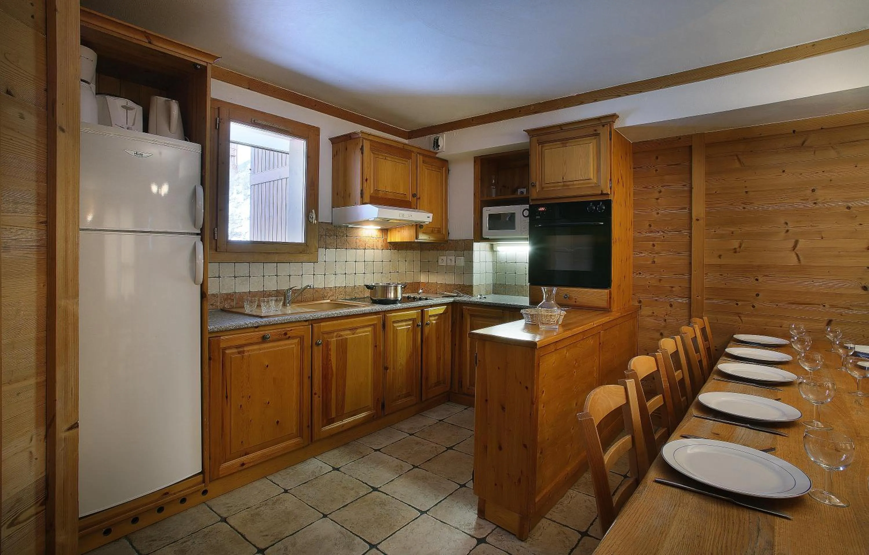 Kitchen or kitchenette in Résidence Les Arolles by Les Etincelles