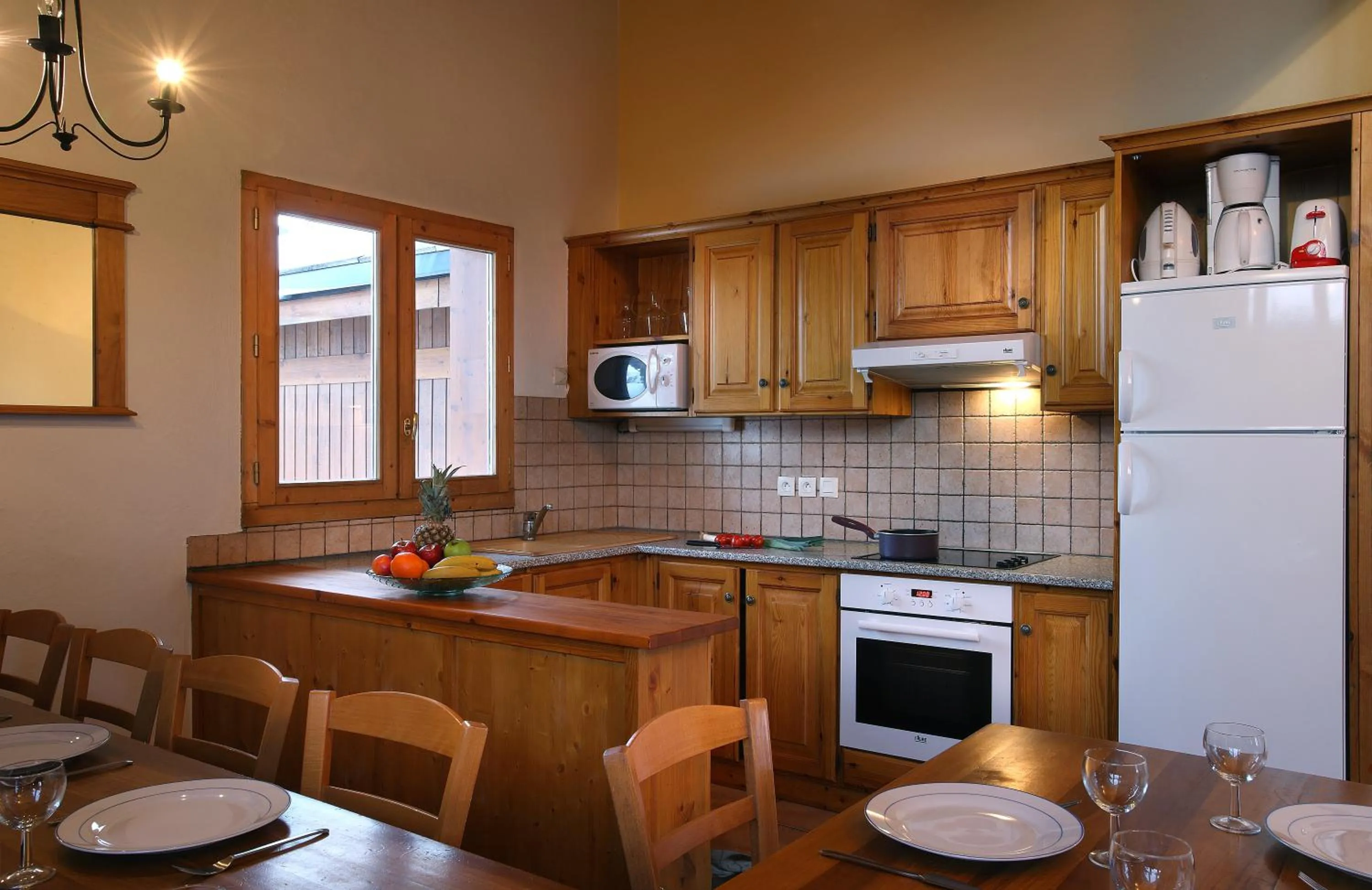 Kitchen or kitchenette in Résidence Les Arolles by Les Etincelles