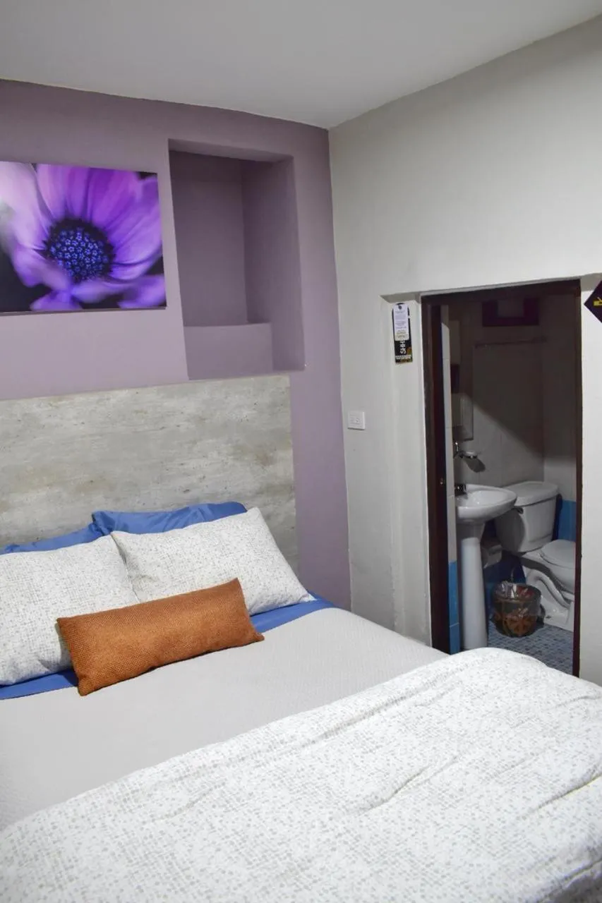 Bed in Hotel Corazón Mexicano