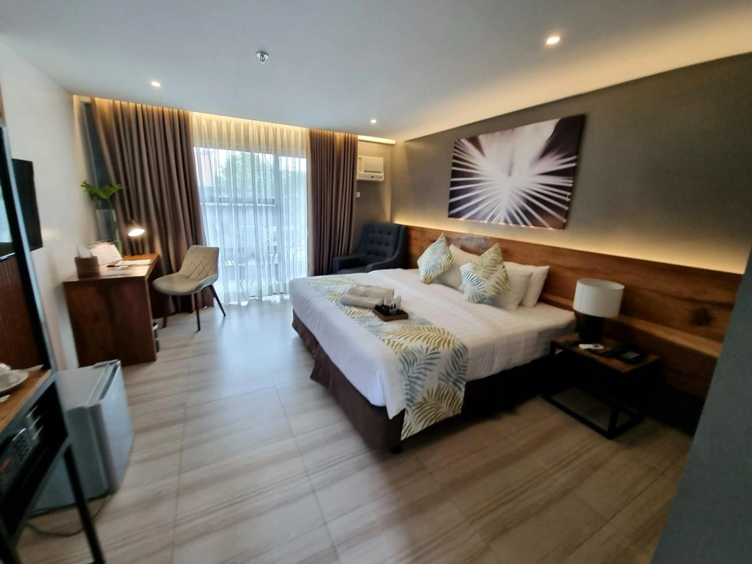 Bed in Balar Hotel and Spa