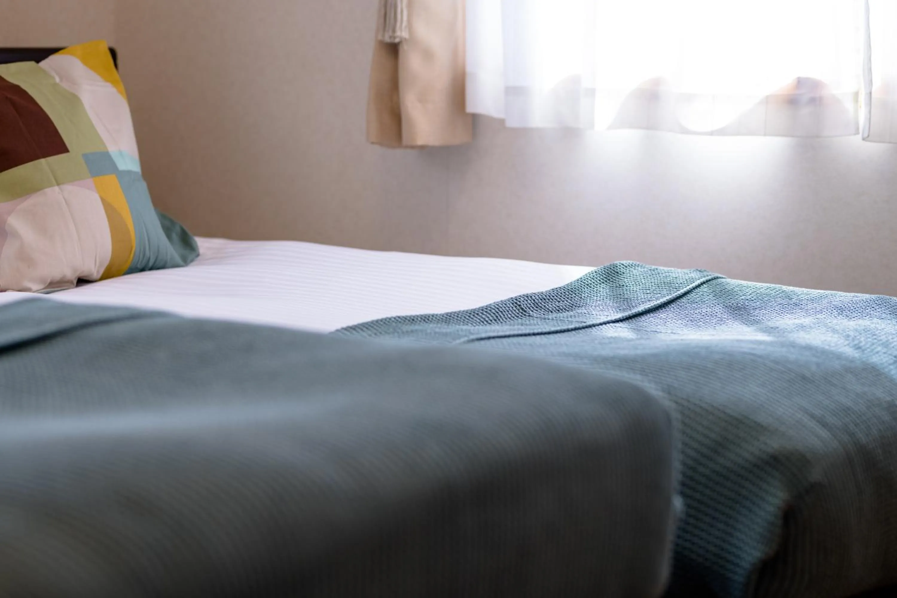 Bed in Ma Maison Mt. Fuji Kawaguchiko