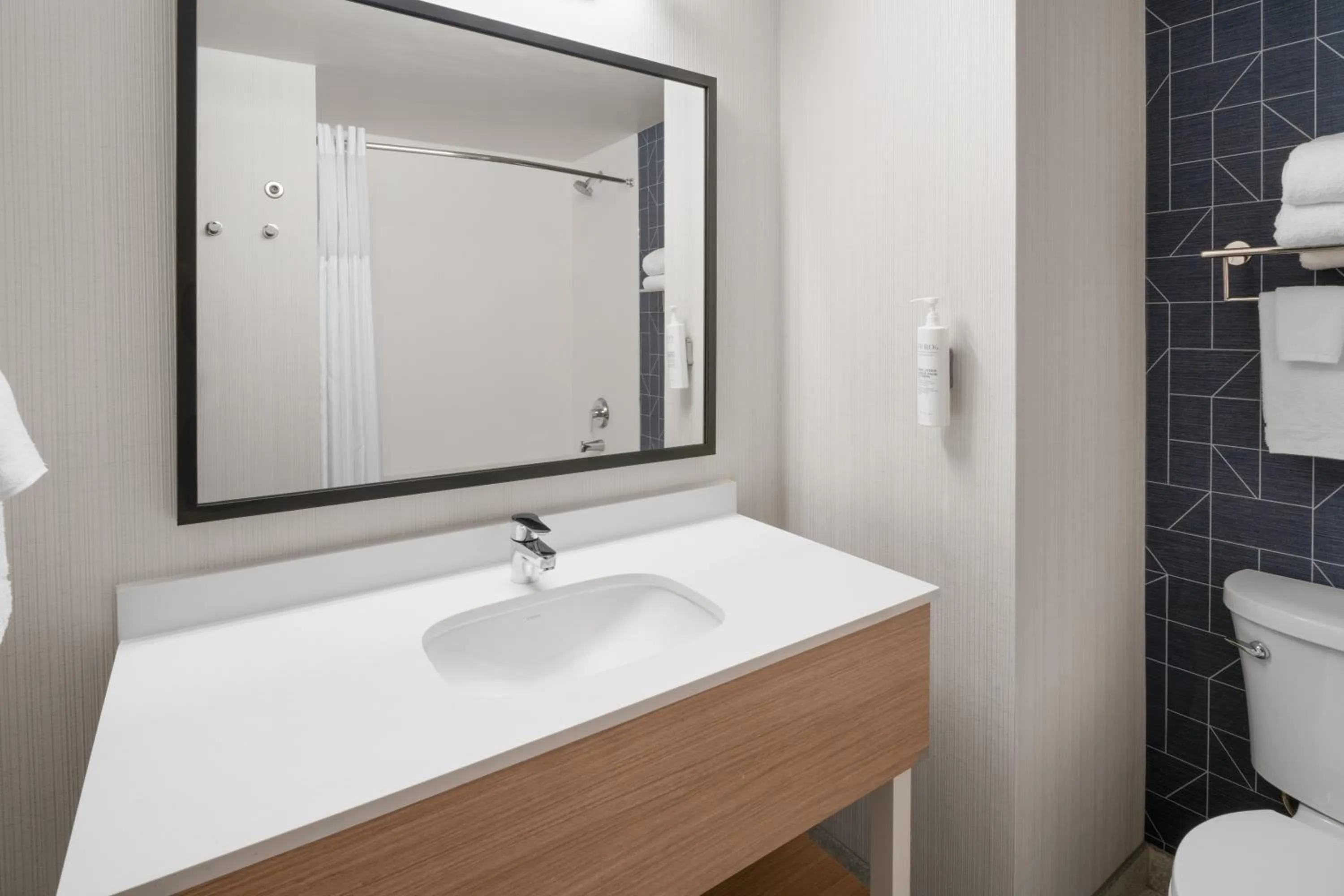 Bathroom in Spark by Hilton Decatur