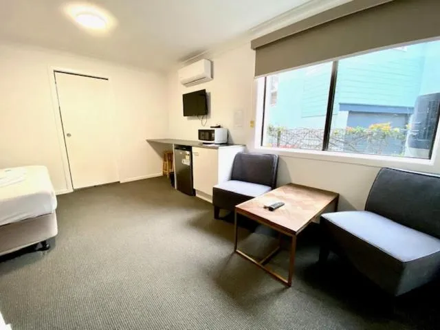 Kitchen or kitchenette, Bed in Huskisson Beach Escape