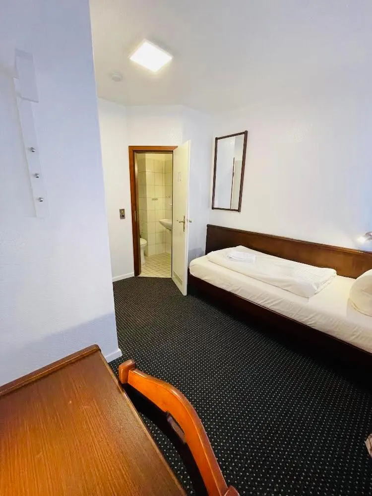 Bed in Brunnen Hotel