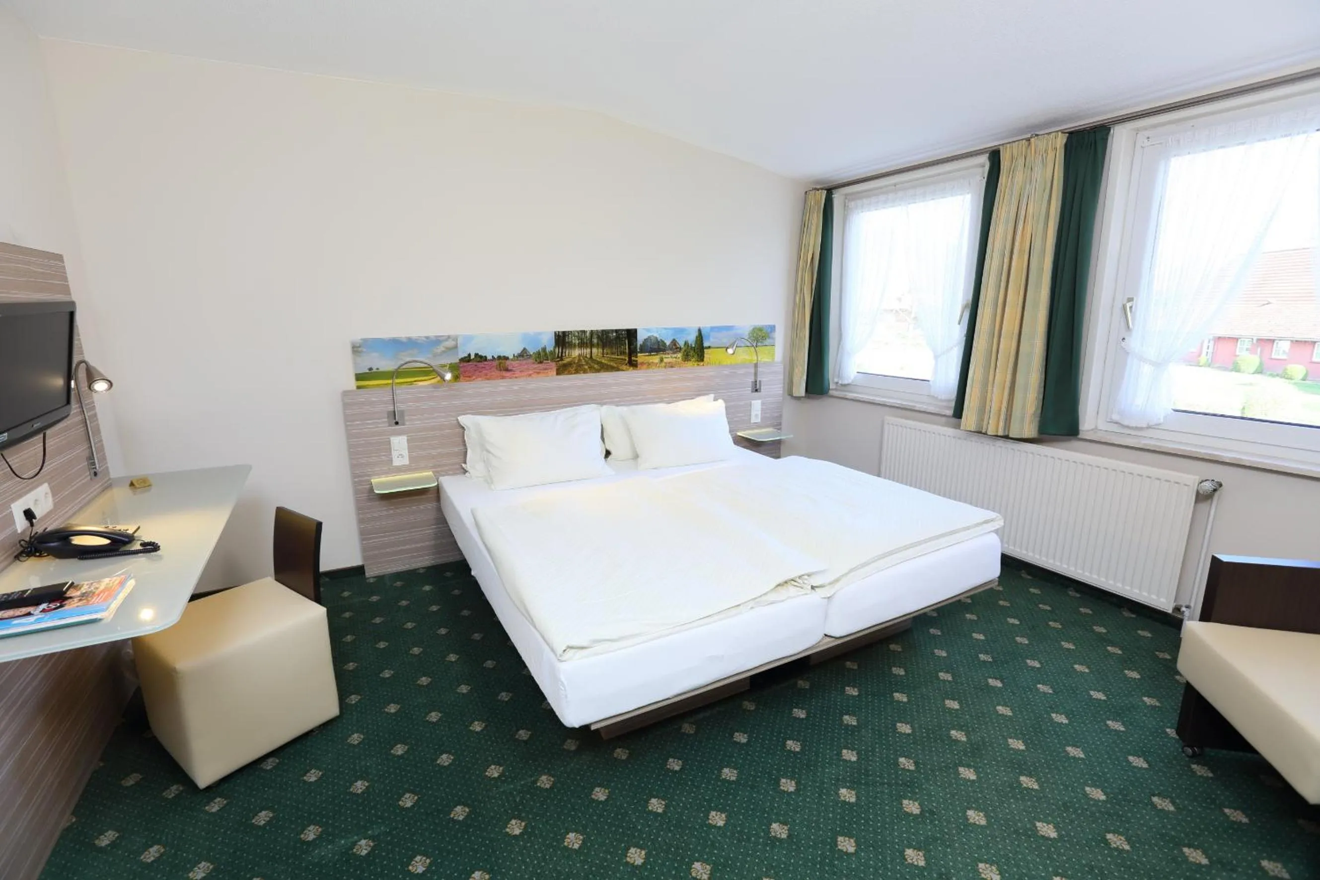 Photo of the whole room, Bed in Jeddinger Hof Land- und Seminarhotel