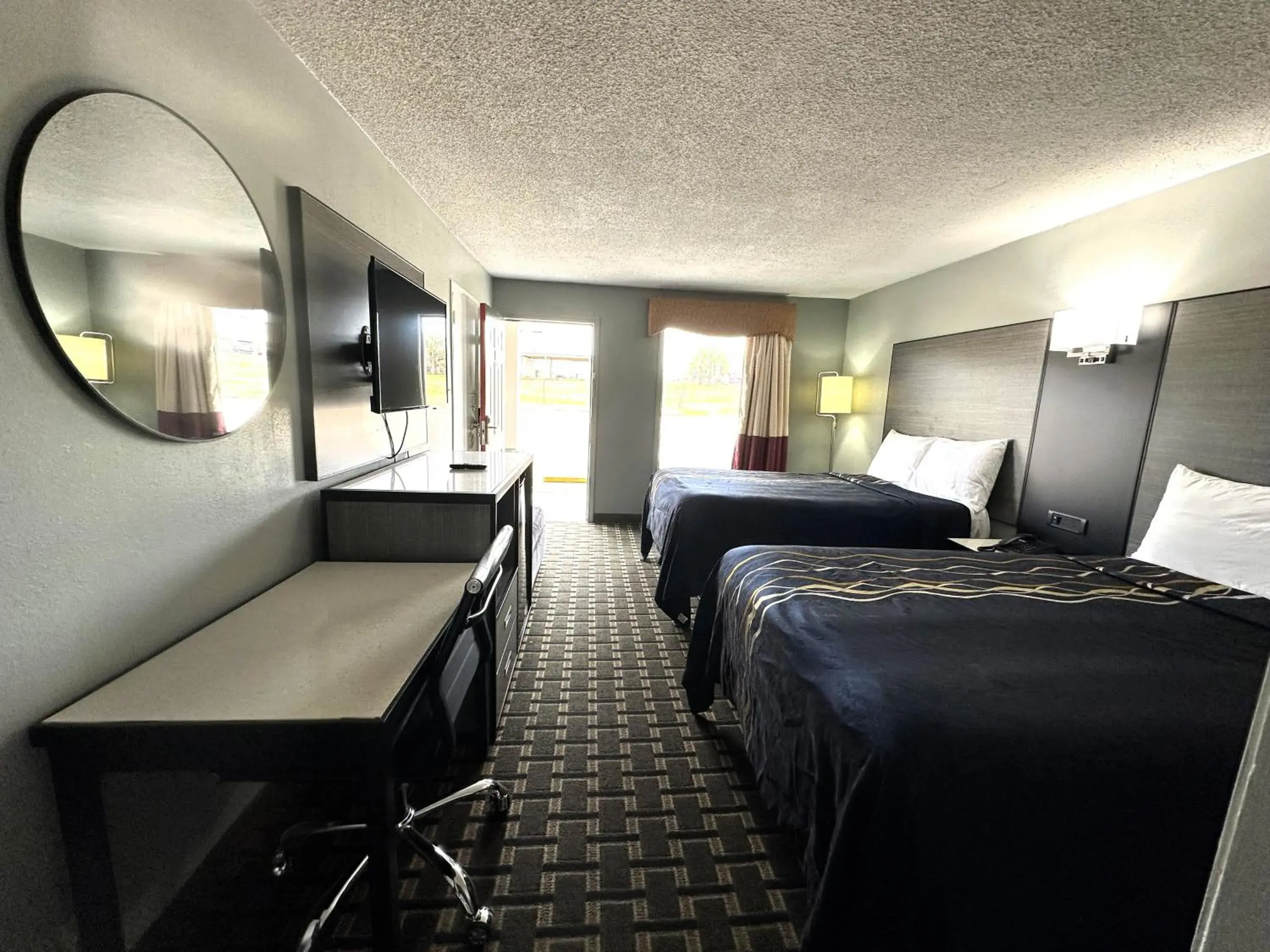 Bed in Red Carpet Inn - Natchez Bed in Red Carpet Inn - Natchez