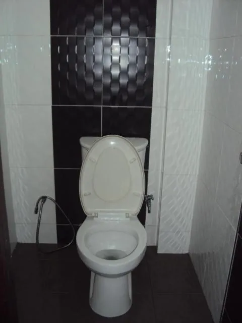 Bathroom in OYO 728 Tai Pan Hotel