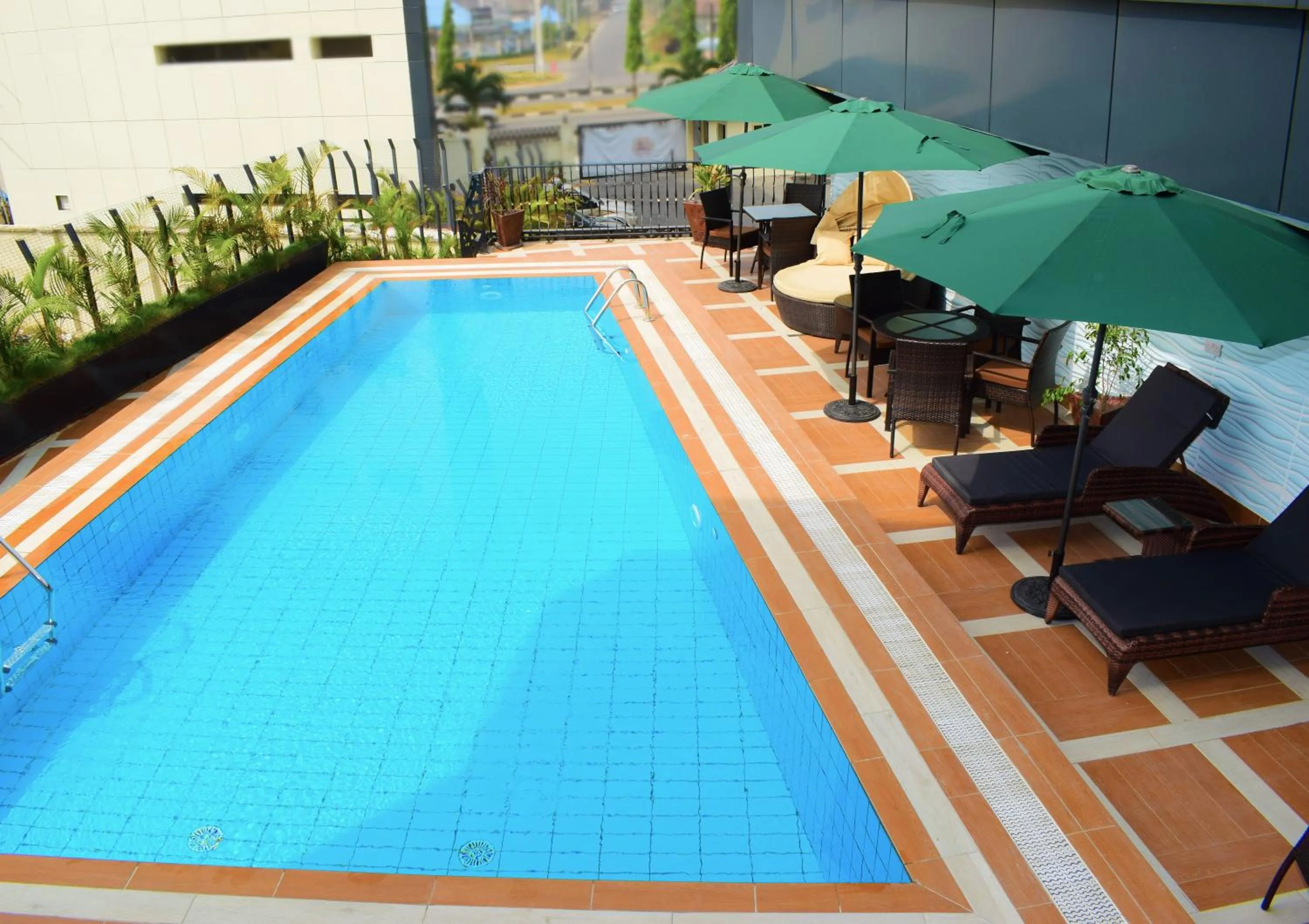 Swimming pool in Monty Suites & Golf