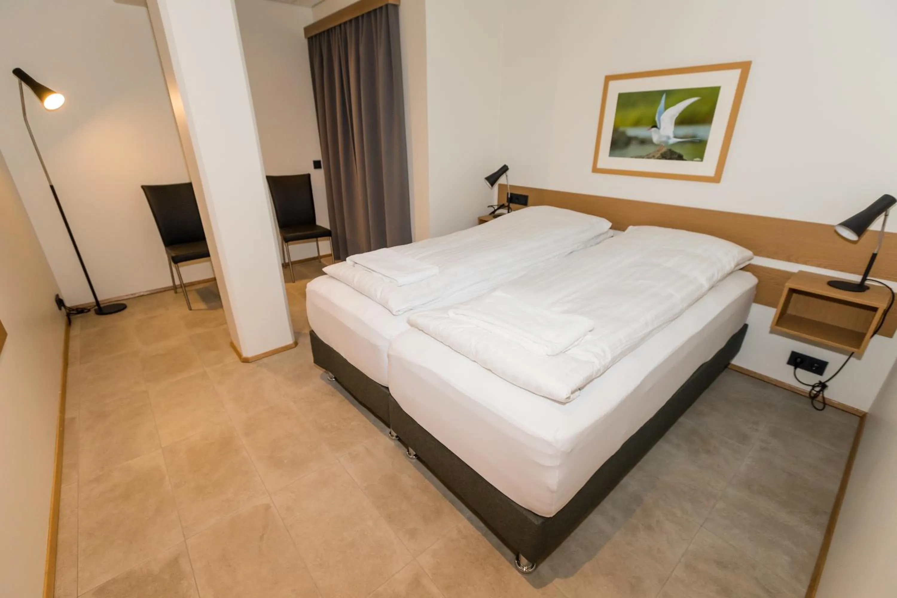 Bed in Hrimland Apartments