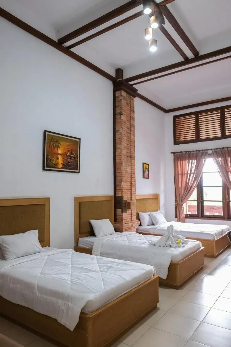 Bed in Jawa Dwipa Heritage Resort Bed in Jawa Dwipa Heritage Resort