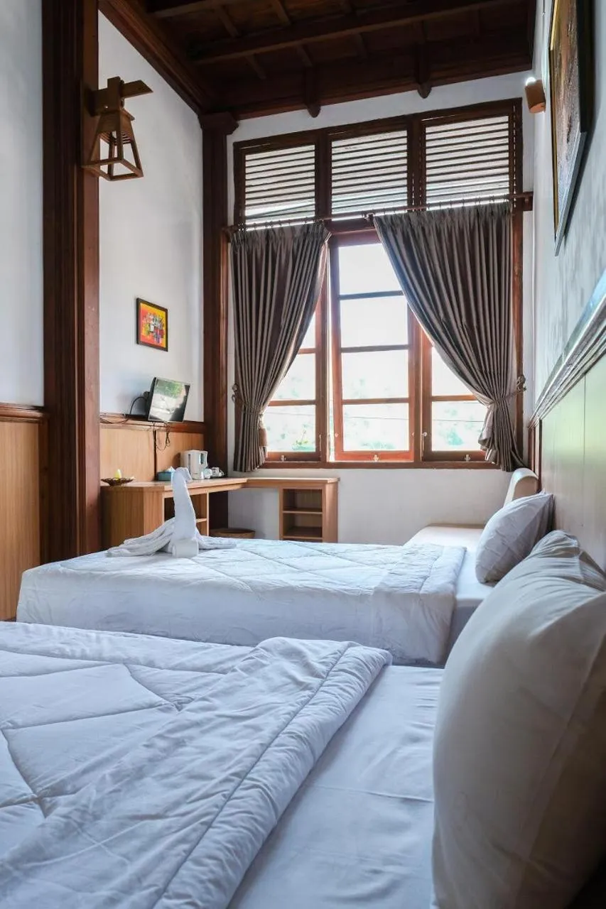 Bed in Jawa Dwipa Heritage Resort