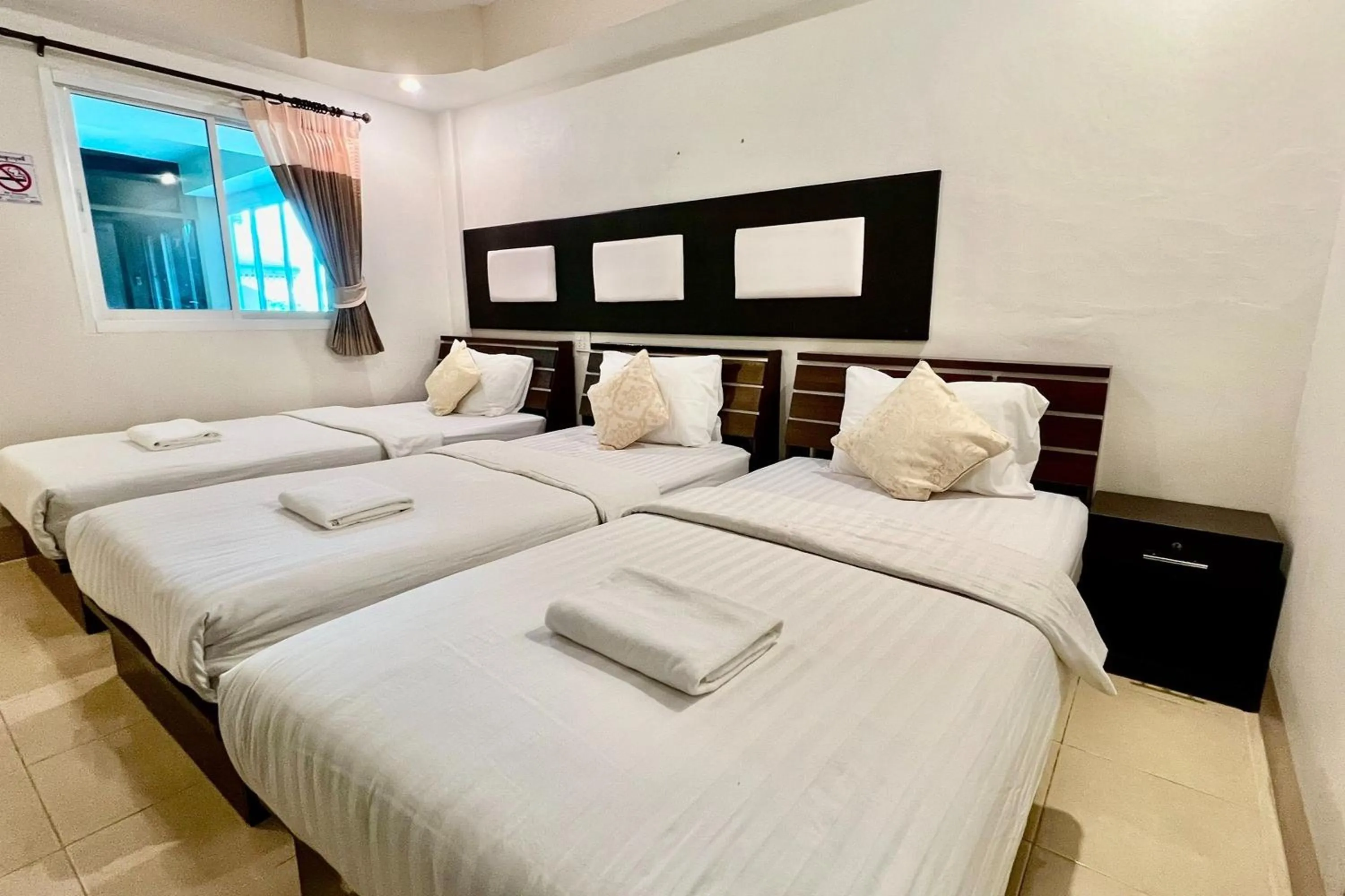 Photo of the whole room, Bed in Nan Thara Place