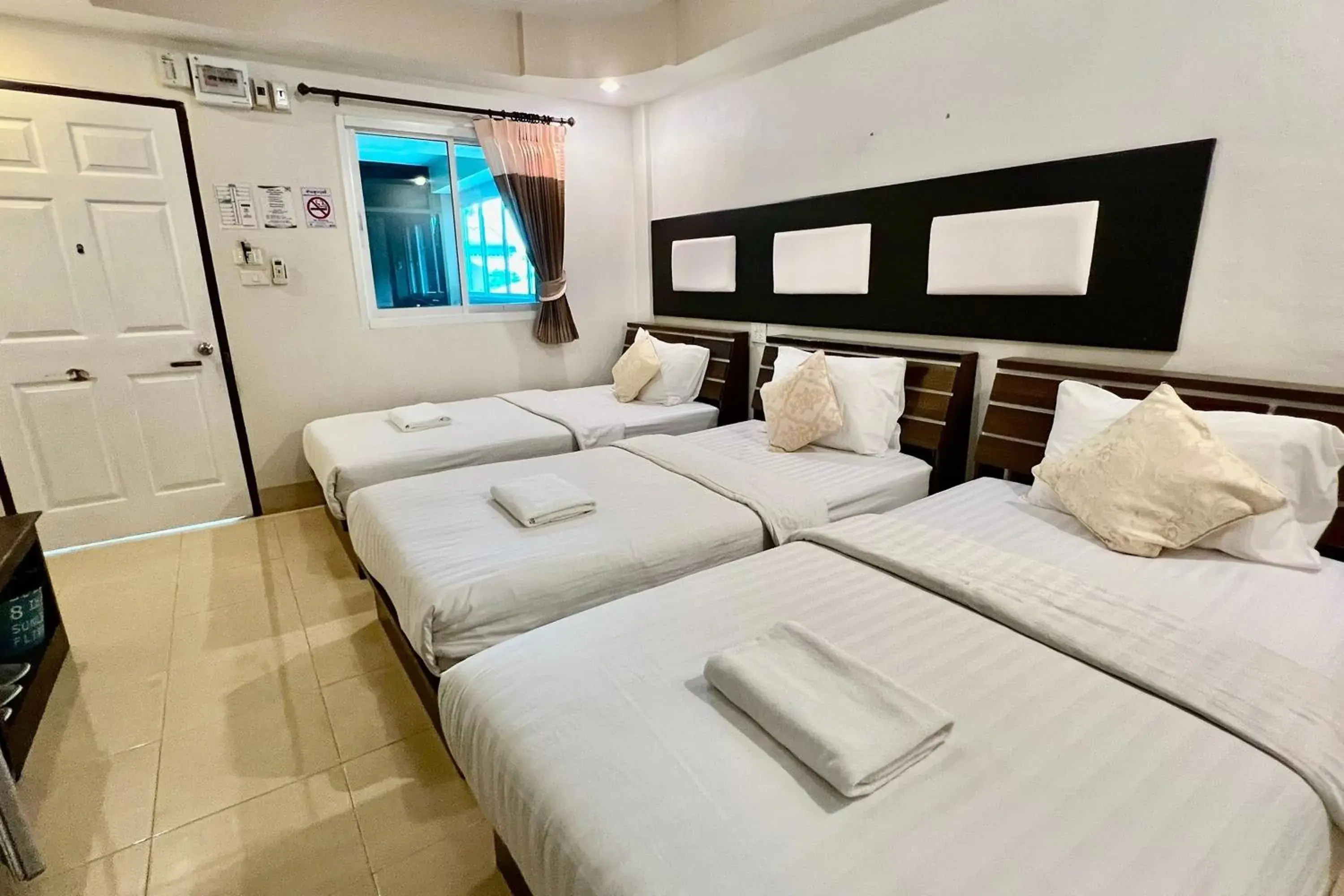 Photo of the whole room, Bed in Nan Thara Place Photo of the whole room, Bed in Nan Thara Place