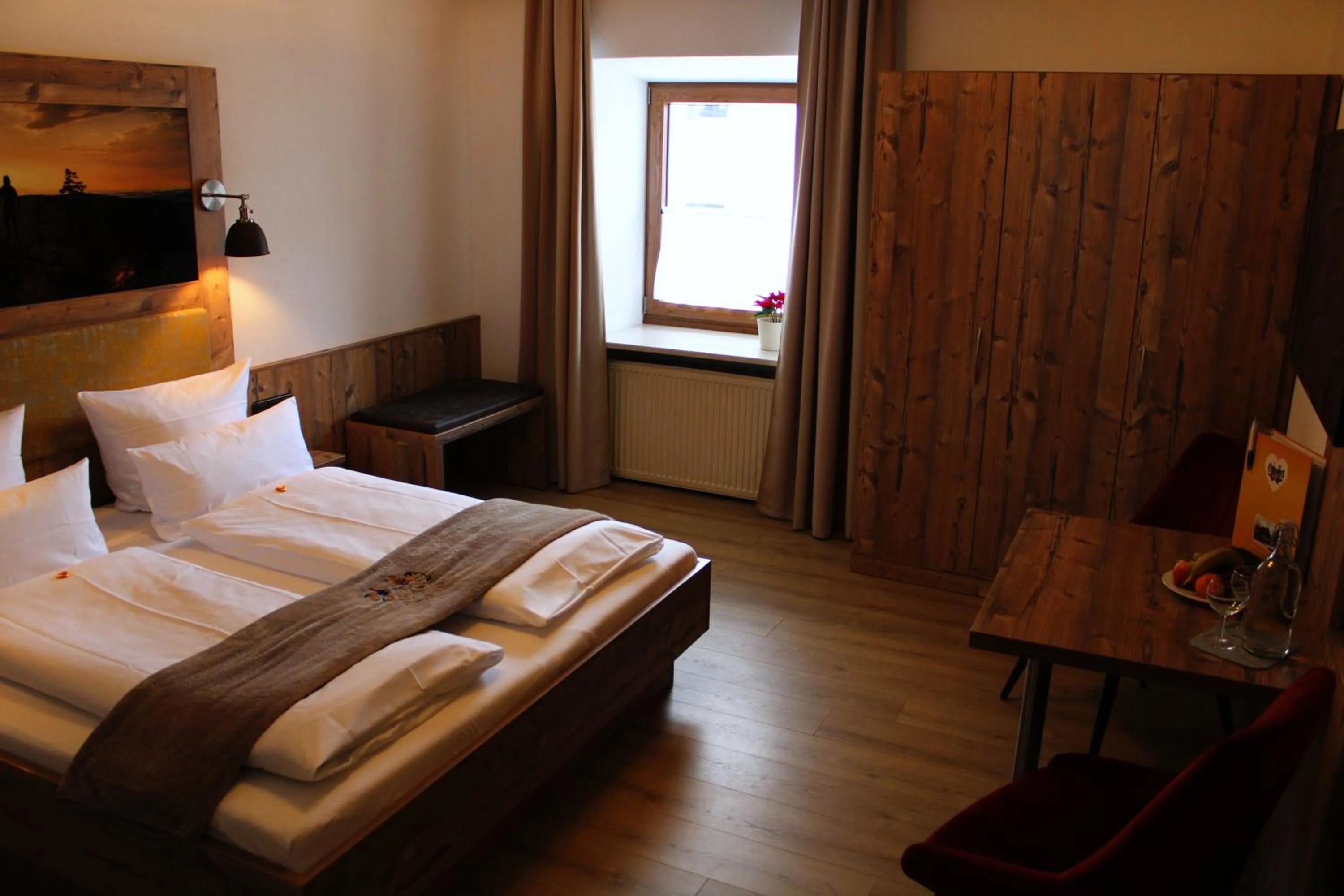 Photo of the whole room, Bed in Bayerische Gastwirtschaft Dimpfl-Stadl