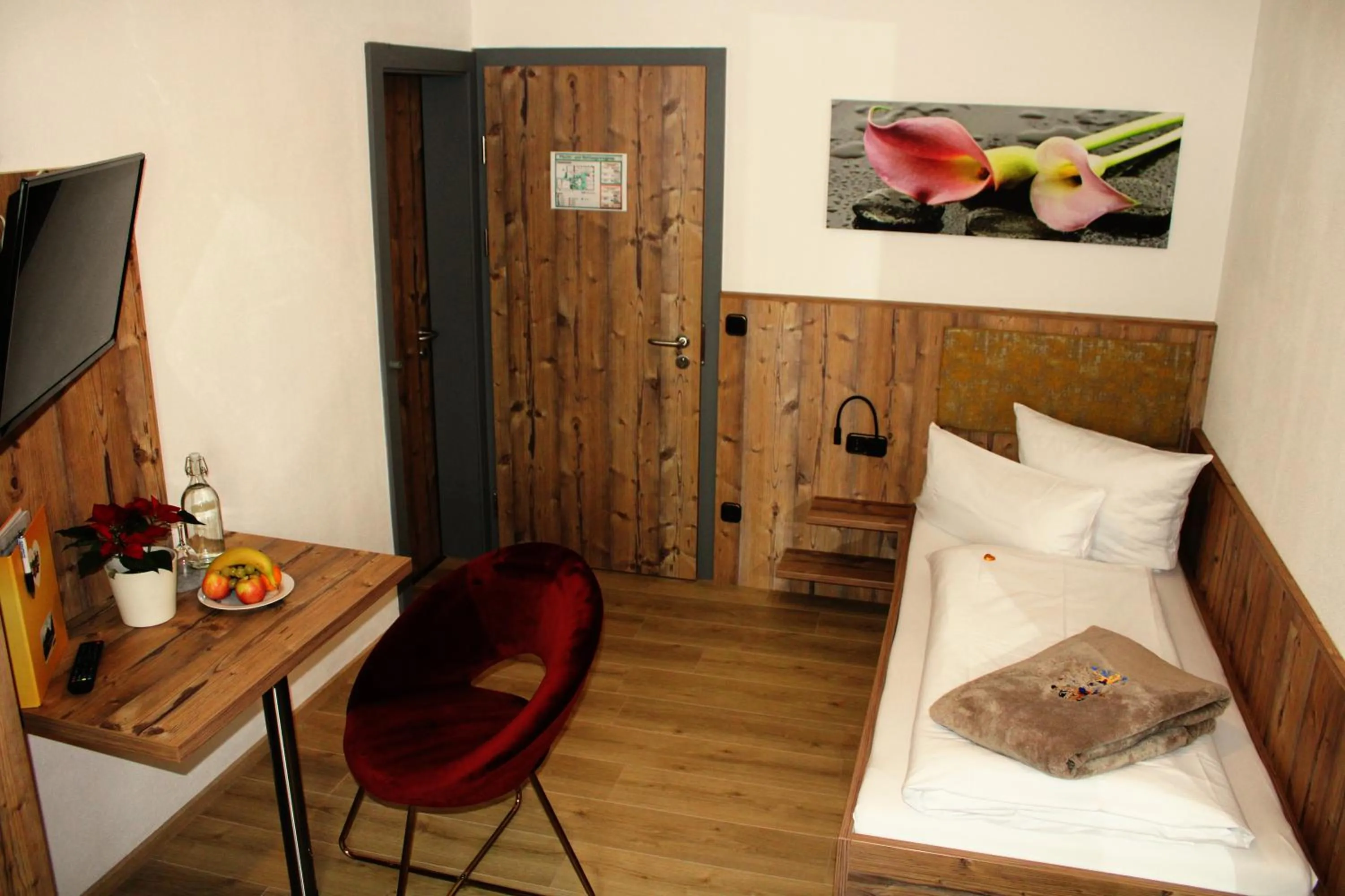 Photo of the whole room, Bed in Bayerische Gastwirtschaft Dimpfl-Stadl