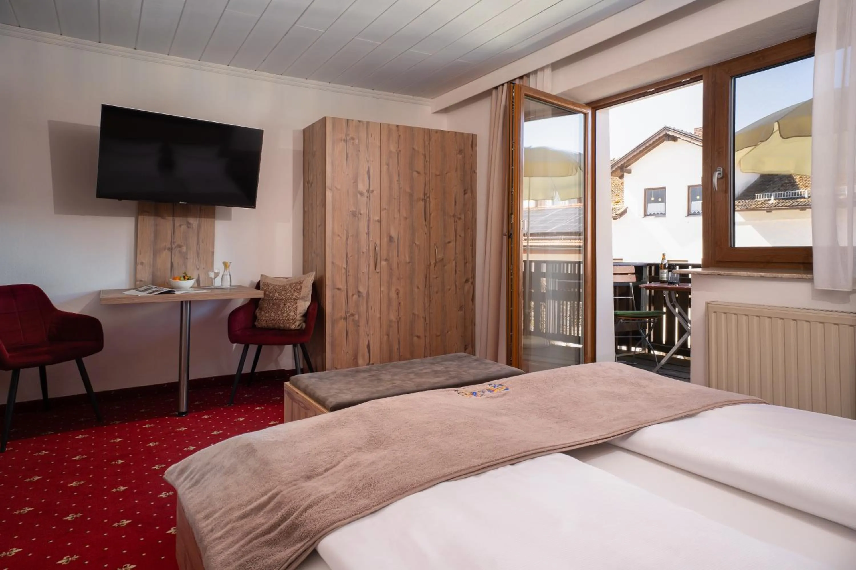 Photo of the whole room, Bed in Bayerische Gastwirtschaft Dimpfl-Stadl