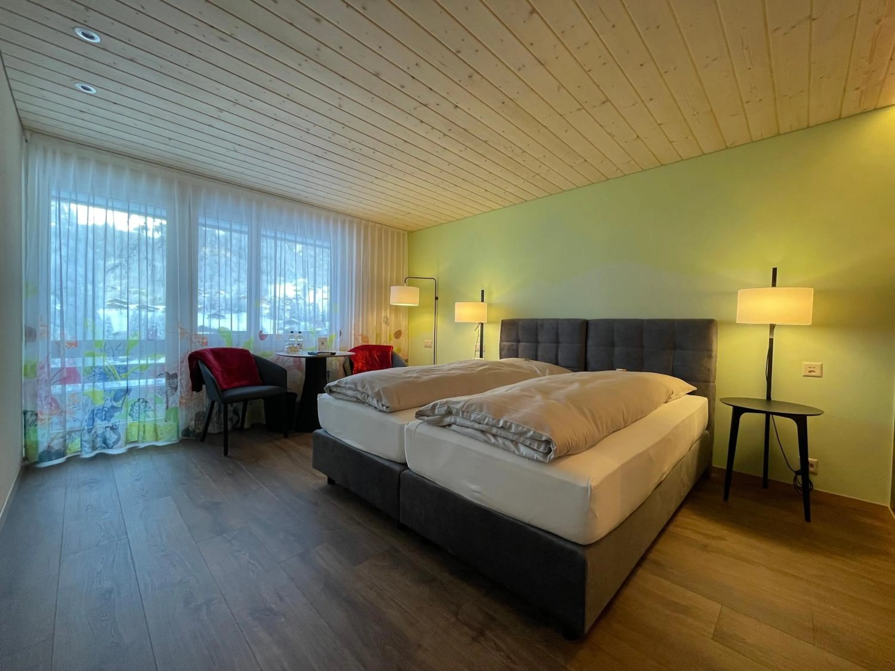 Bed in Ferien- und Familienhotel Alpina Adelboden