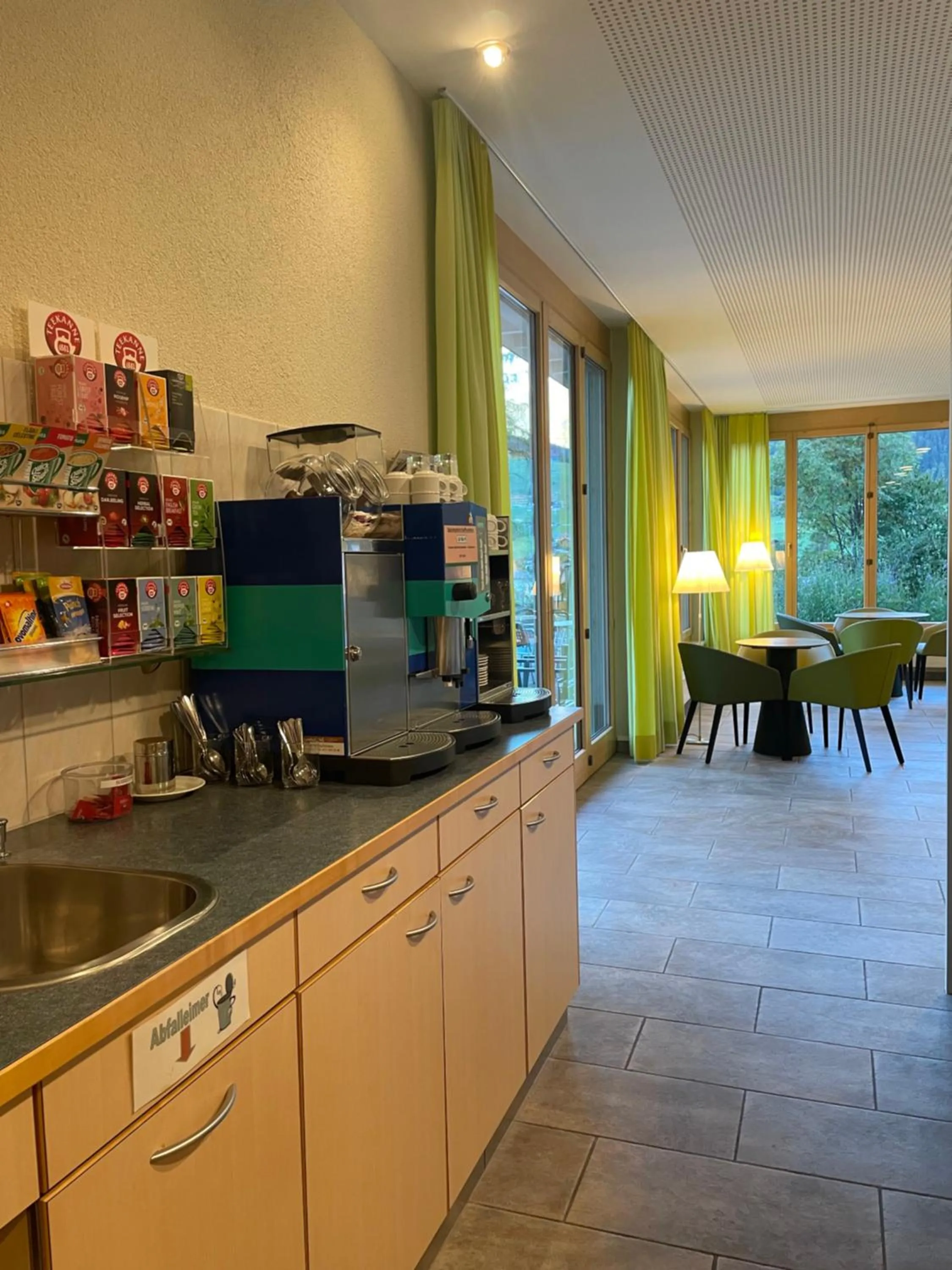 Lobby or reception in Ferien- und Familienhotel Alpina Adelboden