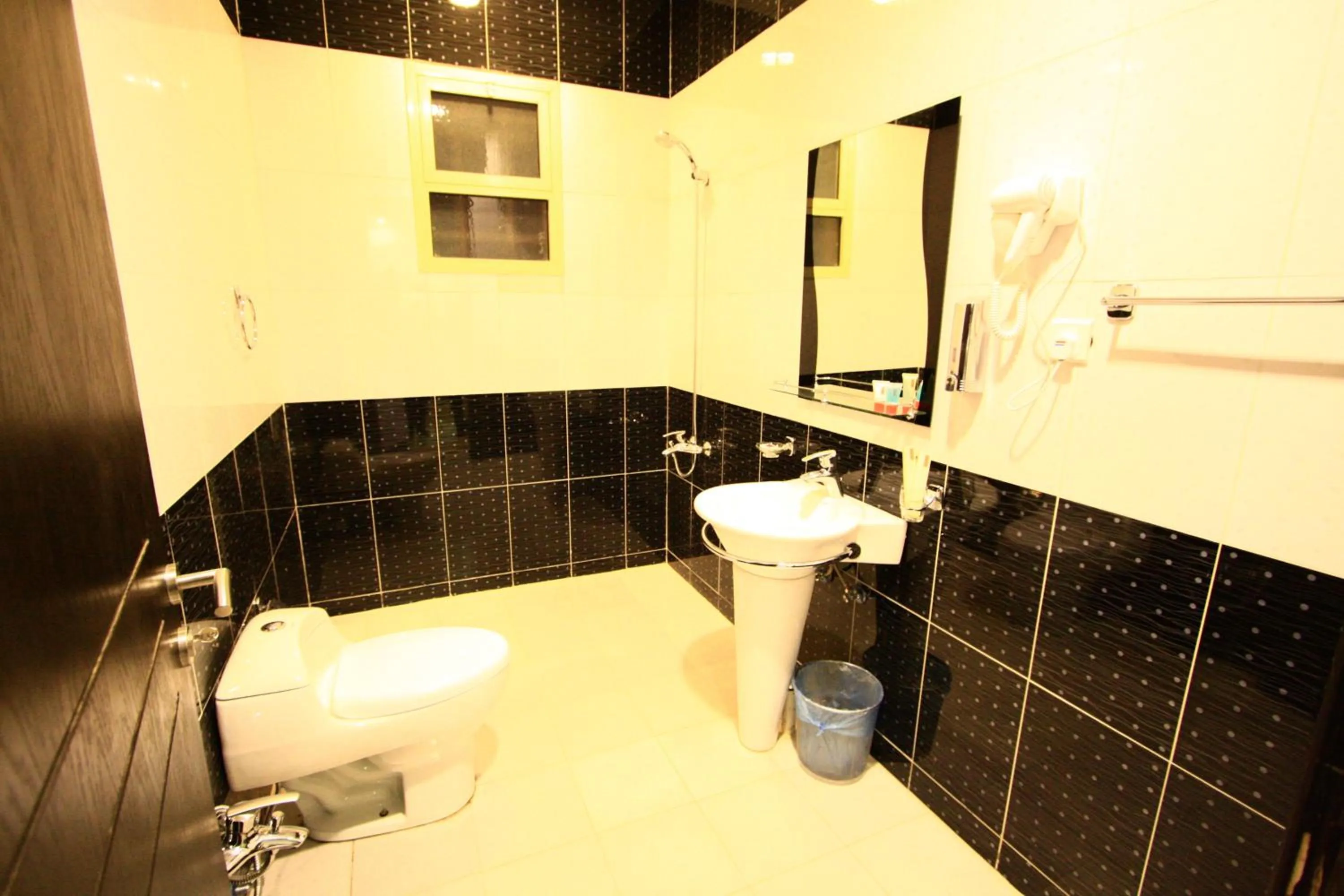 Bathroom in Rest Night Serviced Apartments - Al Nafal
