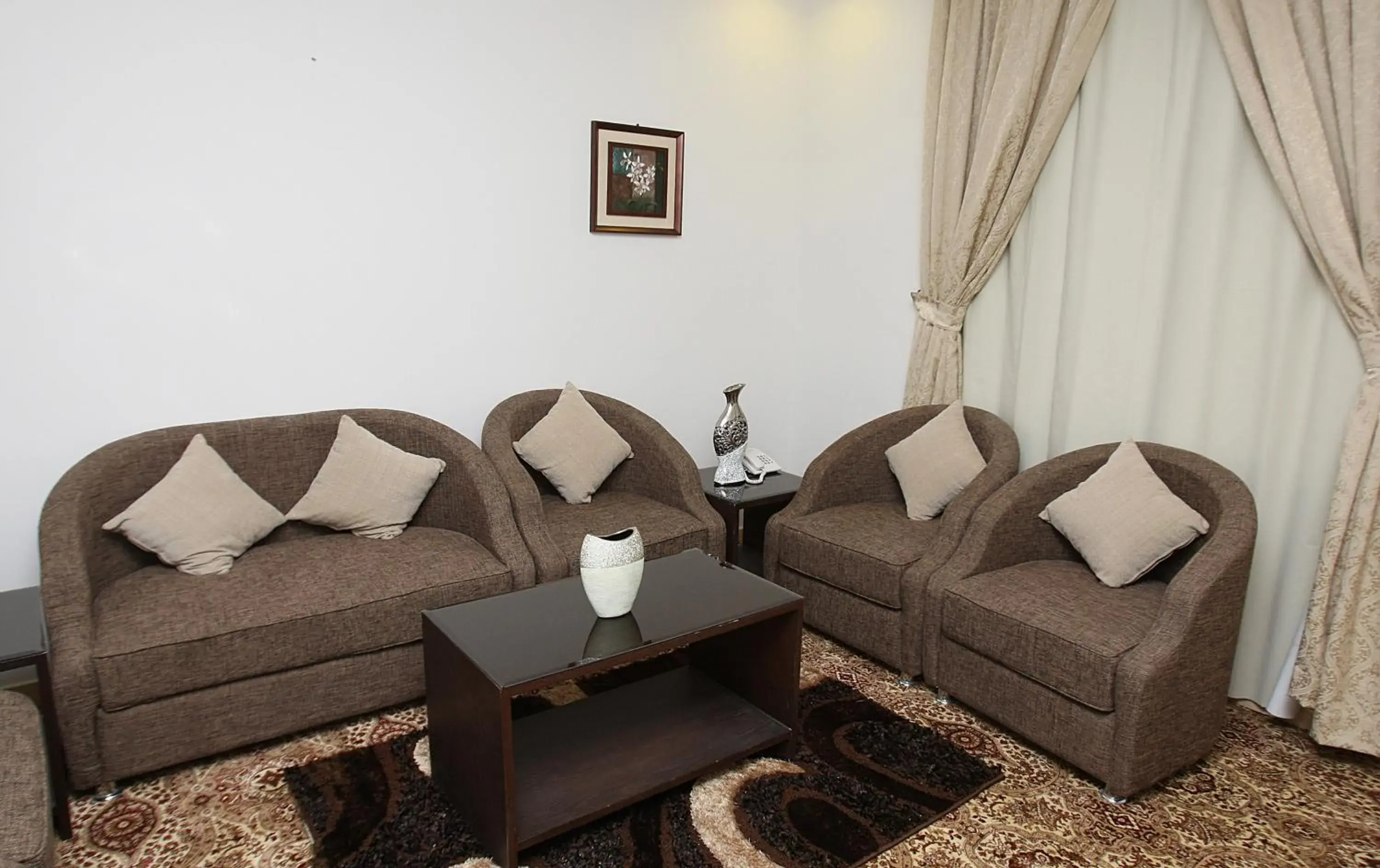 Living room in Rest Night Serviced Apartments - Al Nafal Living room in Rest Night Serviced Apartments - Al Nafal
