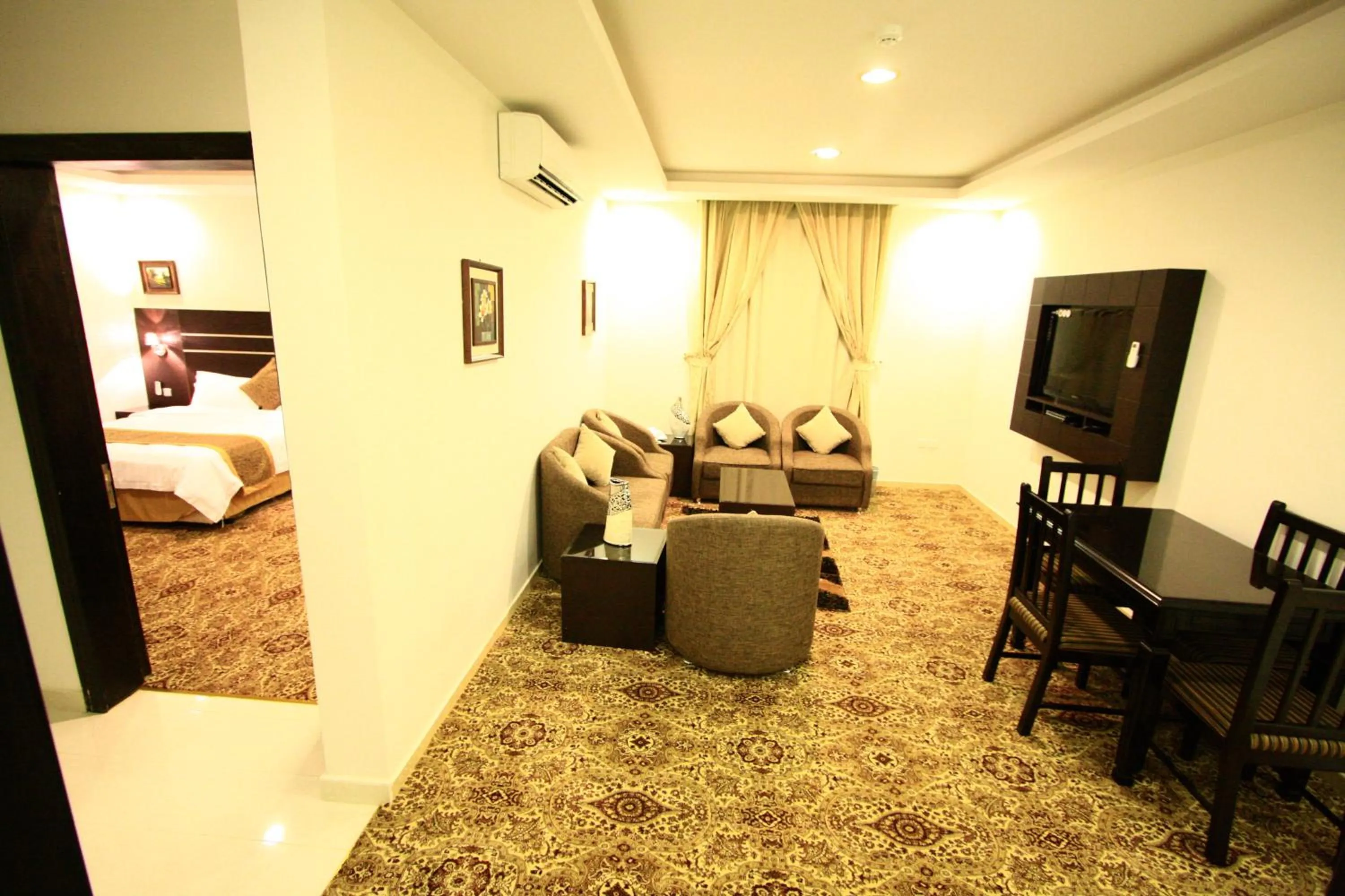 Living room, Bed in Rest Night Serviced Apartments - Al Nafal
