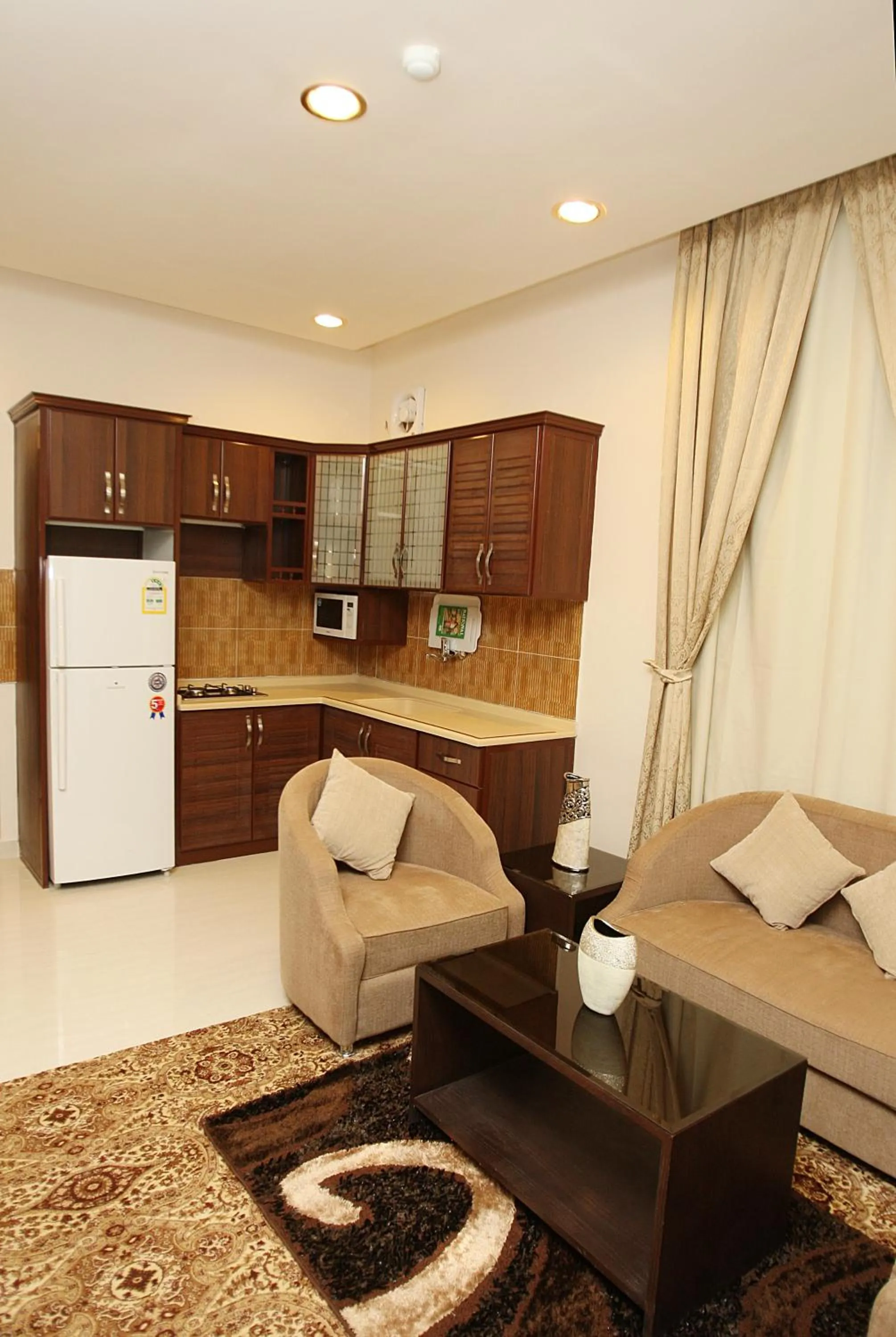 Kitchen or kitchenette in Rest Night Serviced Apartments - Al Nafal