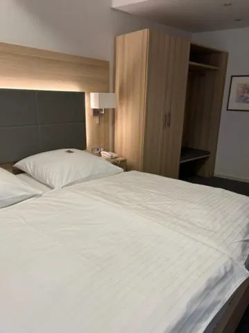 Bed in Hotel Kaiserhof