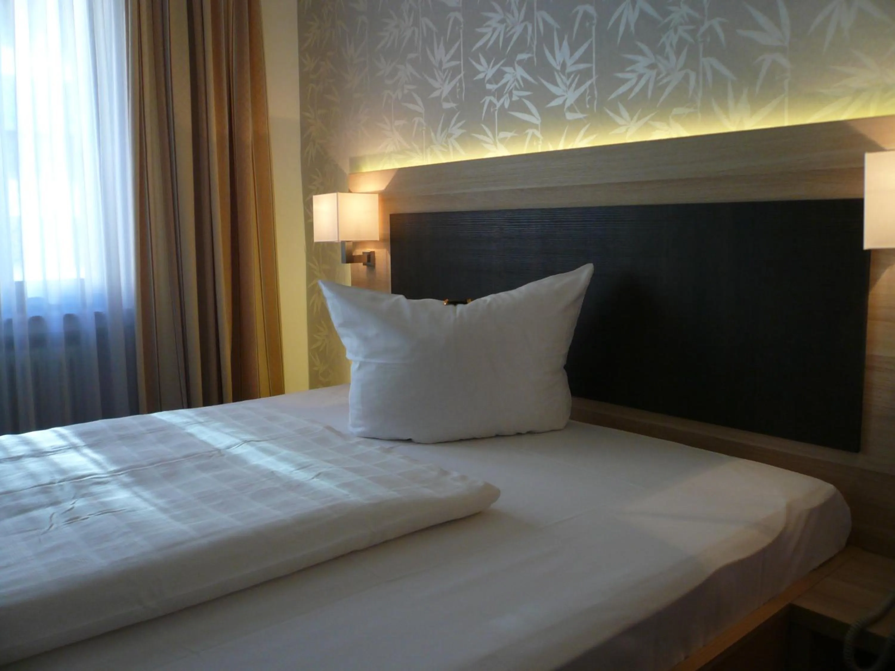 Bed in Hotel Kaiserhof