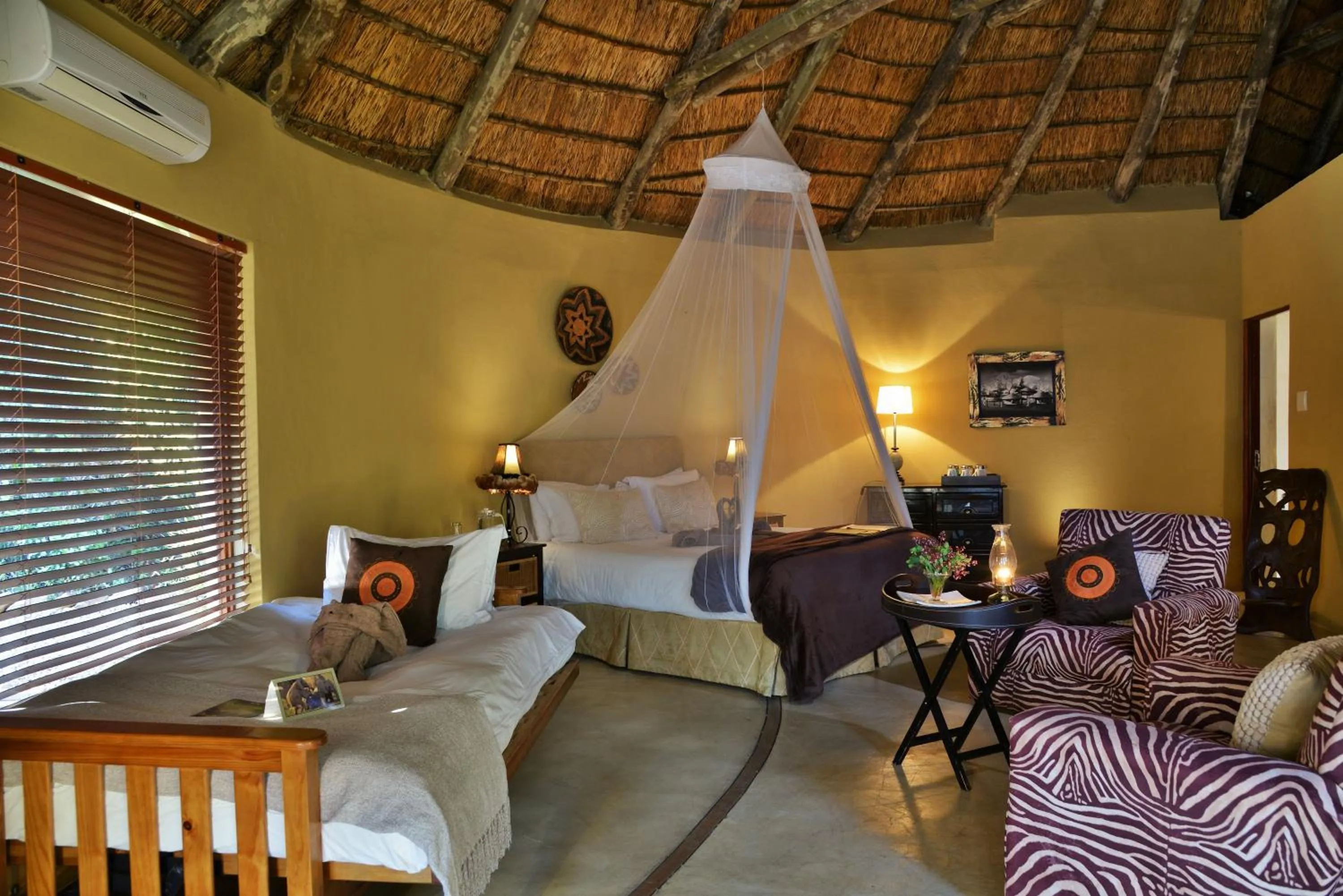 Photo of the whole room, Bed in Sibuya Game Reserve and Lodge