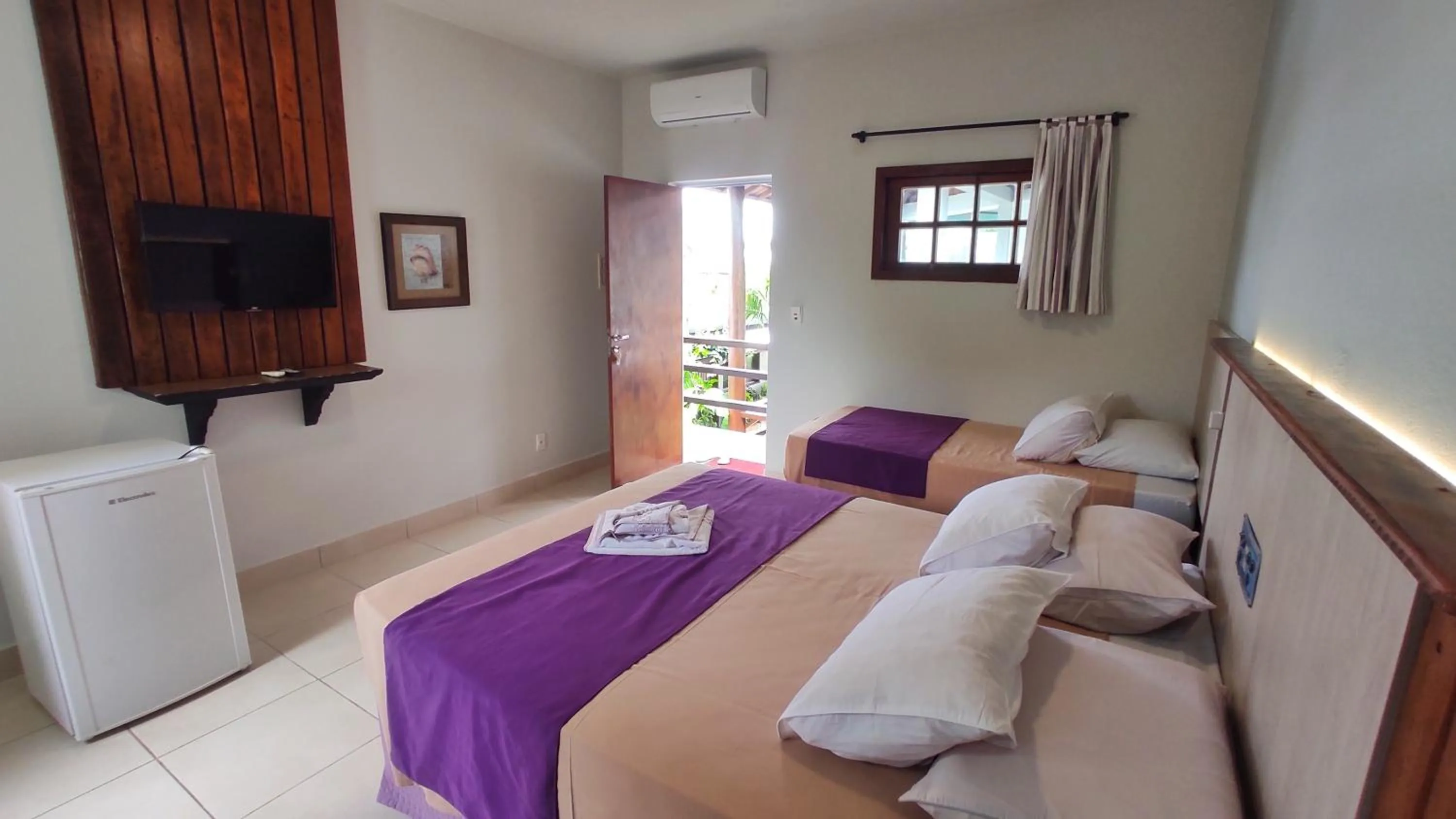 Bed in Pousada Novo Prado