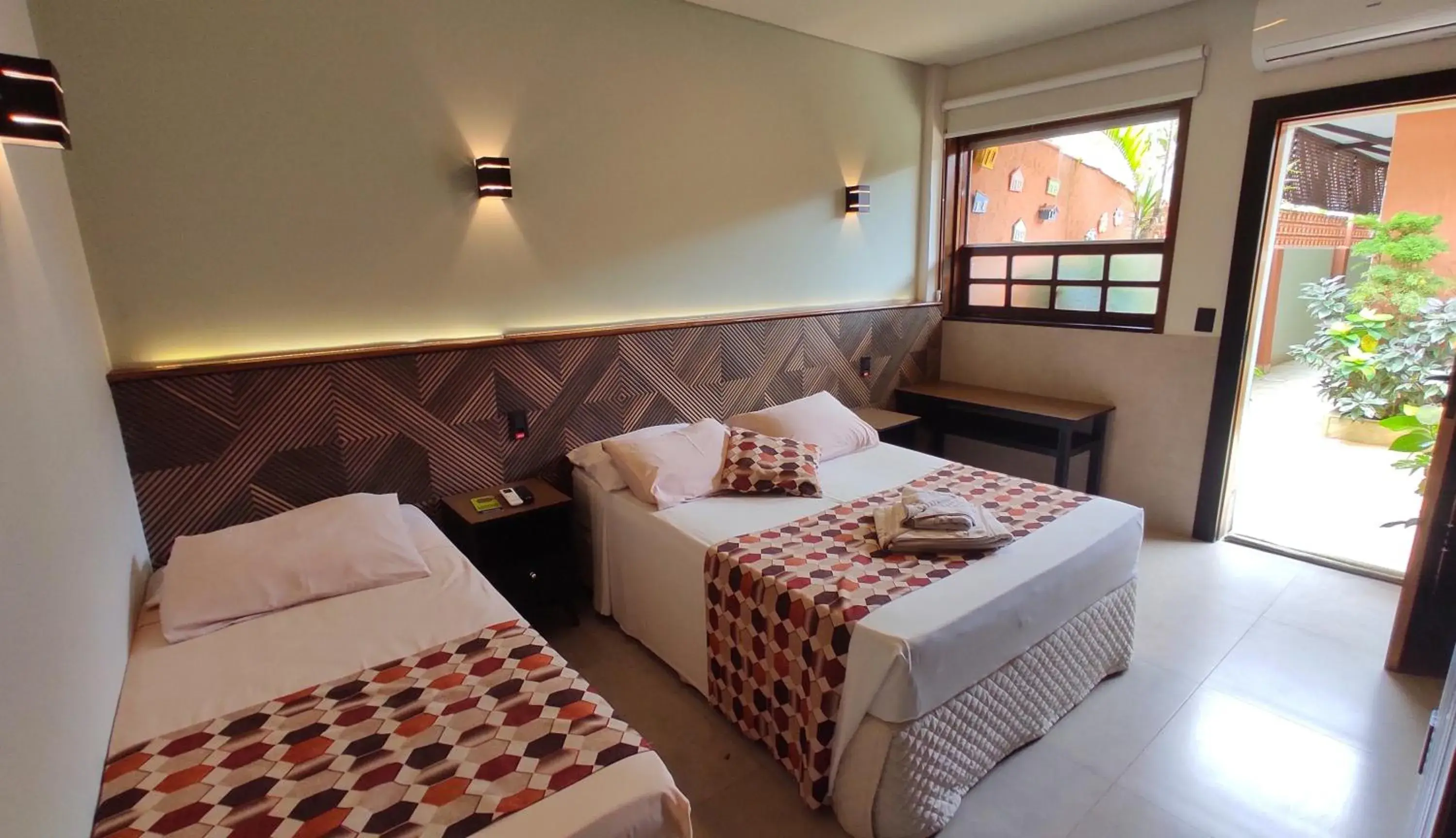 Standard Triple Room in Pousada Novo Prado Standard Triple Room in Pousada Novo Prado