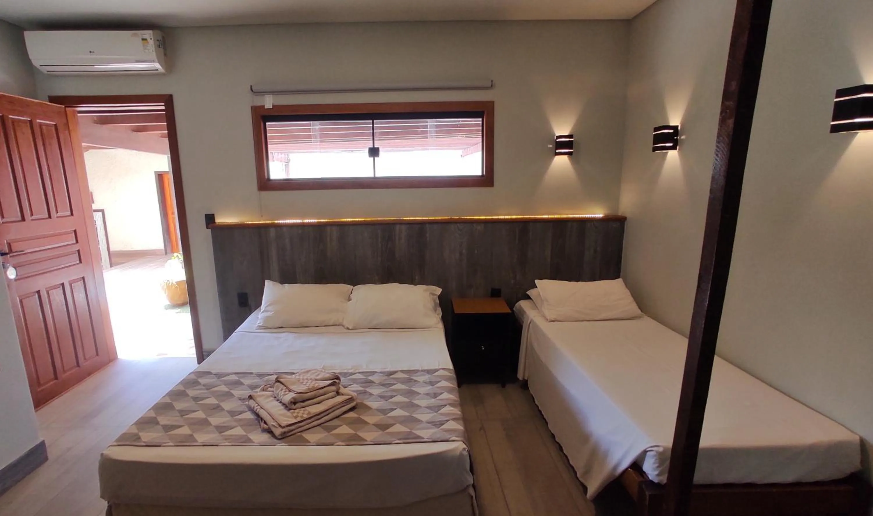 Bed in Pousada Novo Prado