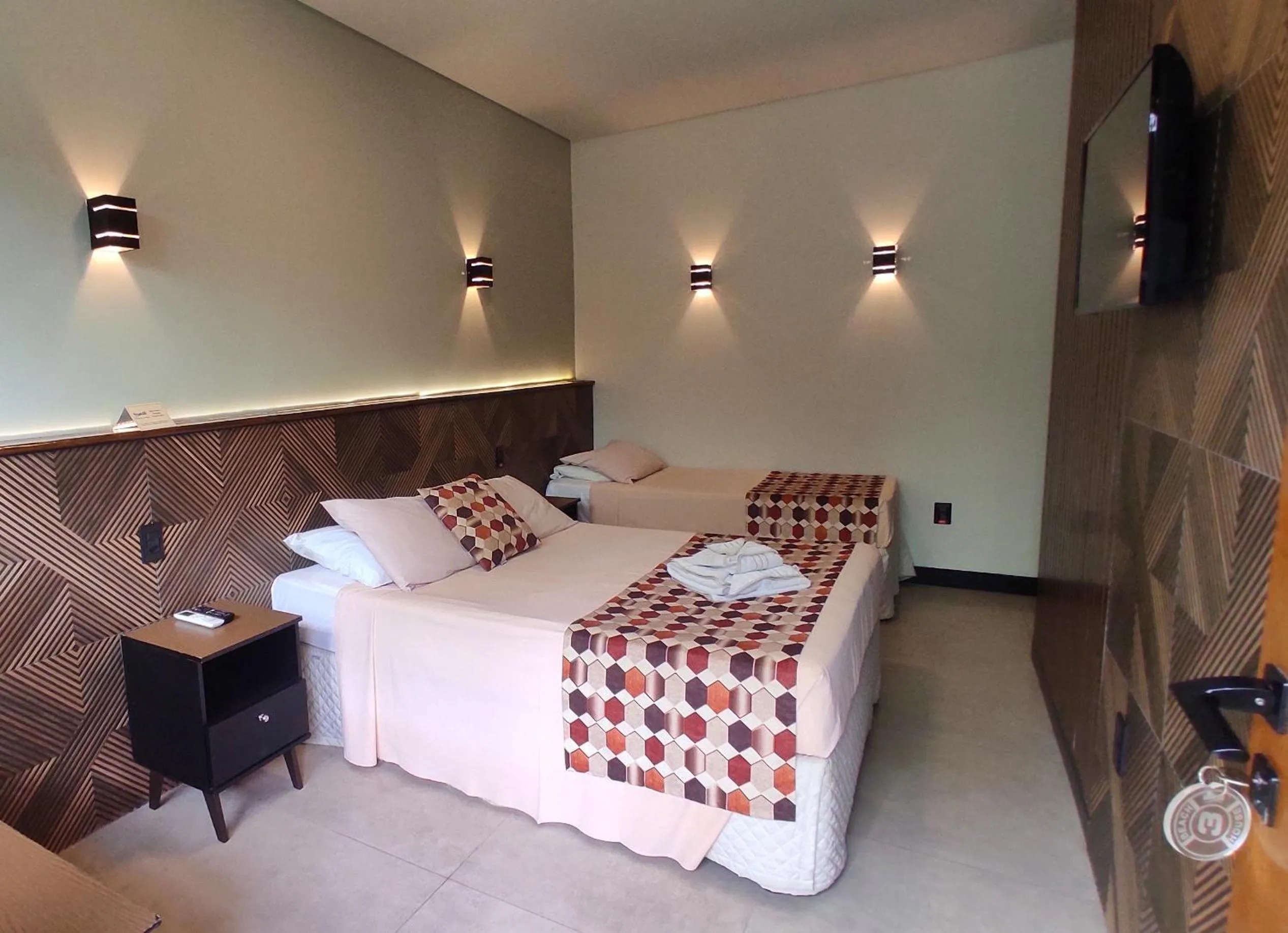 Bed in Pousada Novo Prado