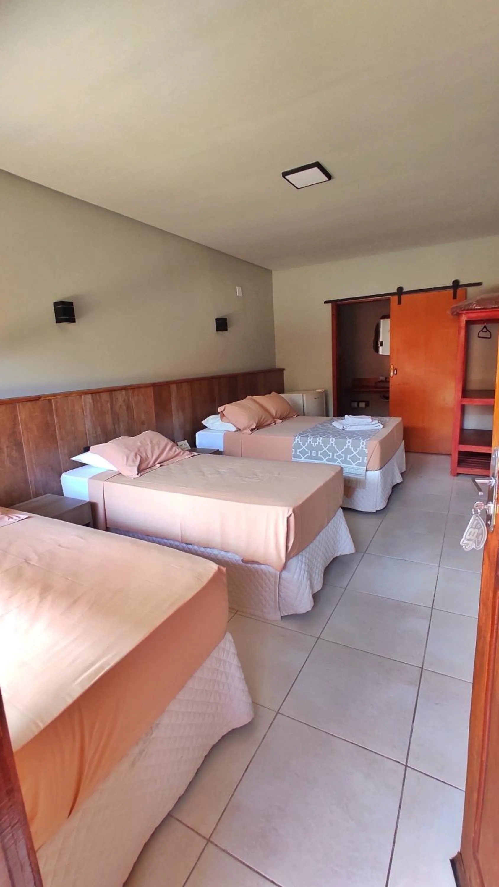 Bed in Pousada Novo Prado