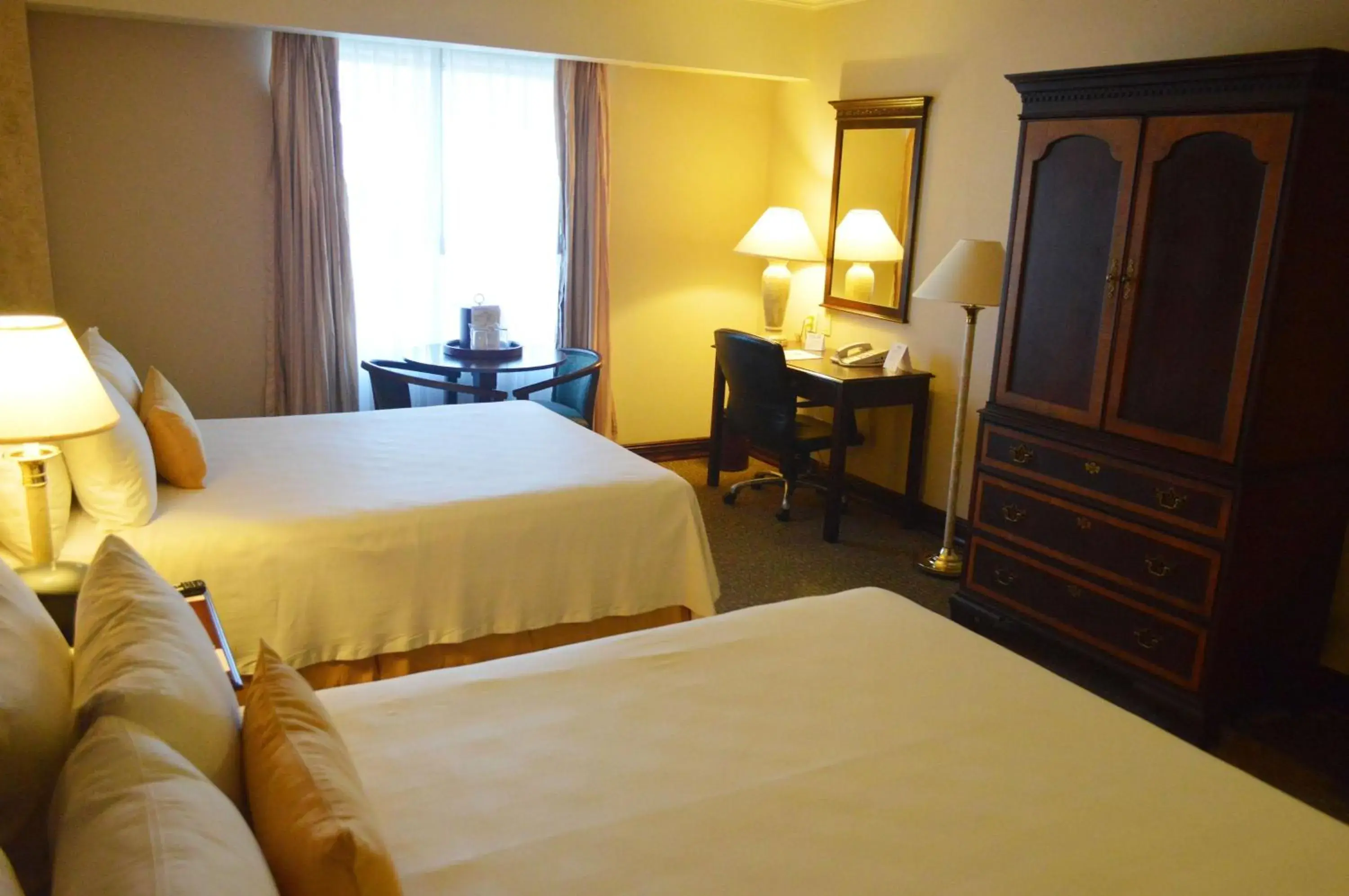 Photo of the whole room, Bed in Best Western PLUS Nuevo Laredo Inn & Suites Photo of the whole room, Bed in Best Western PLUS Nuevo Laredo Inn & Suites