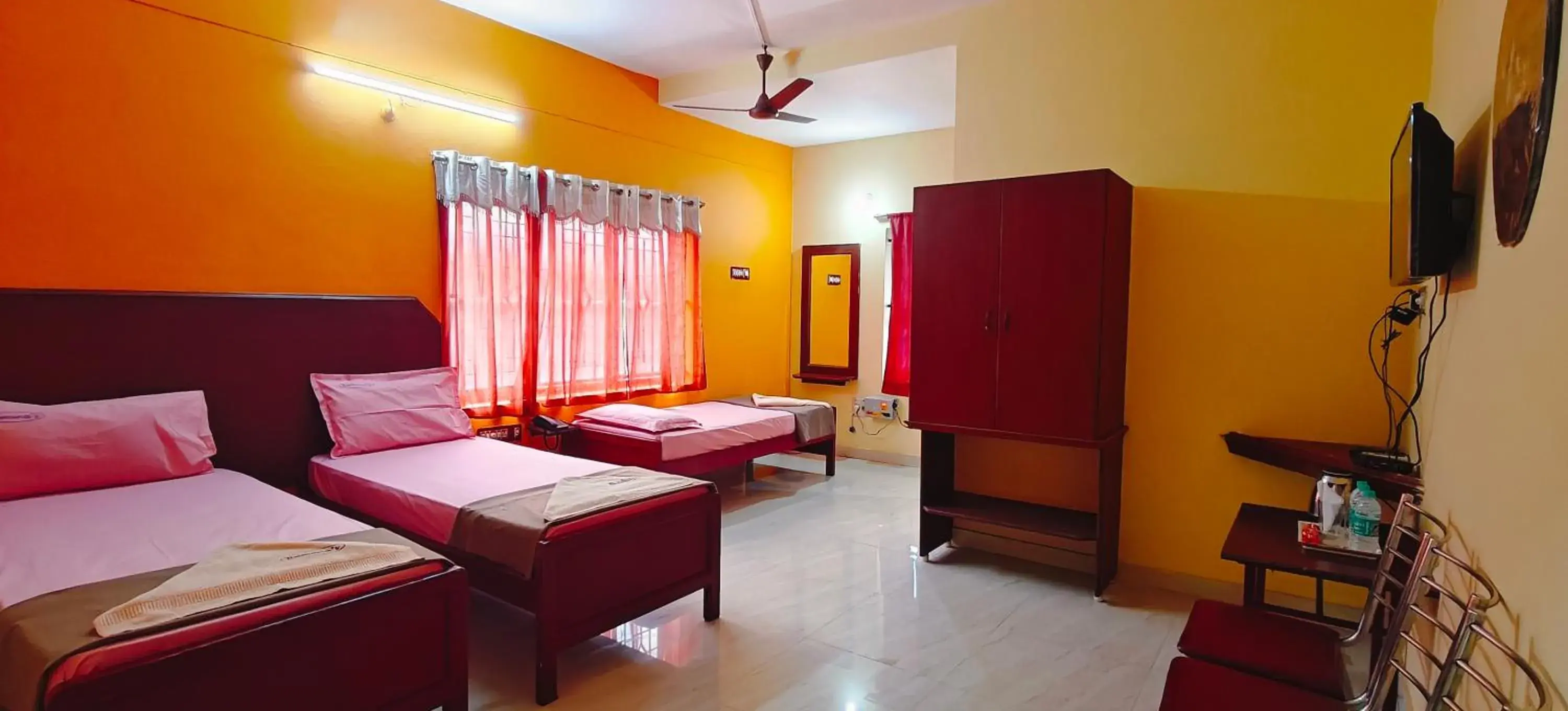 Classic Triple Room in Sri Venkkatramanaas Residency Classic Triple Room in Sri Venkkatramanaas Residency