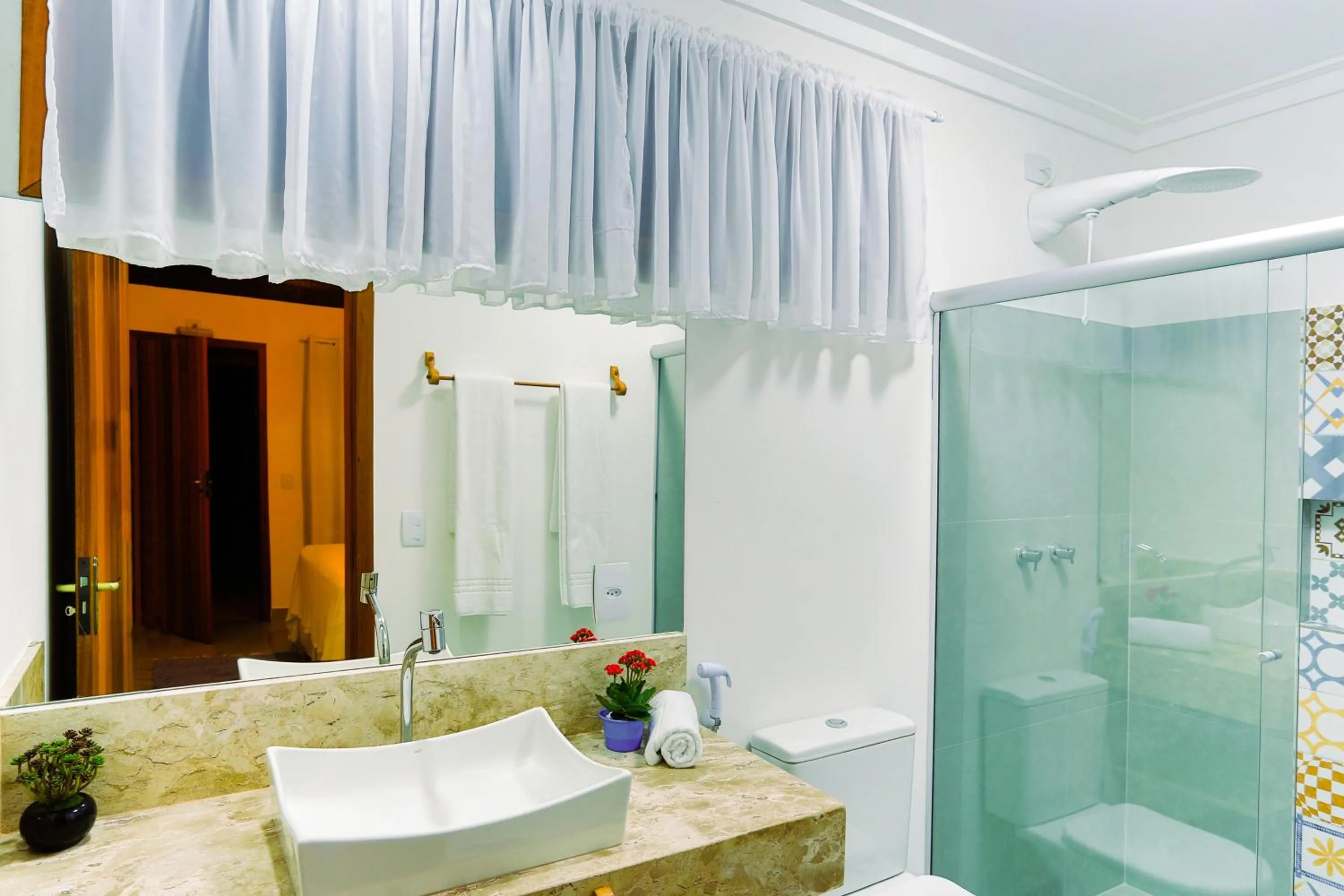 Shower in Pousada Recanto do Arraial