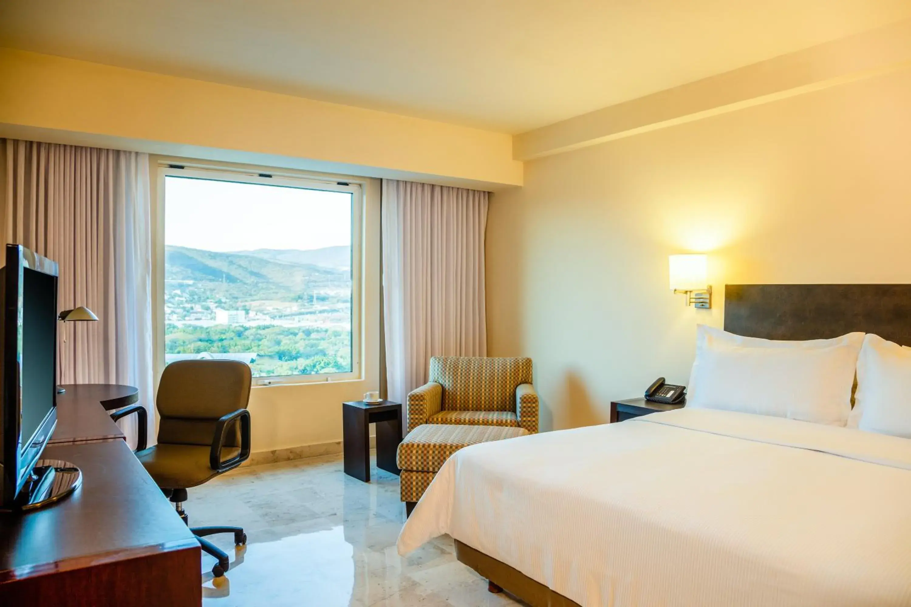 Photo of the whole room, Bed in Fiesta Inn Tuxtla Gutierrez Photo of the whole room, Bed in Fiesta Inn Tuxtla Gutierrez