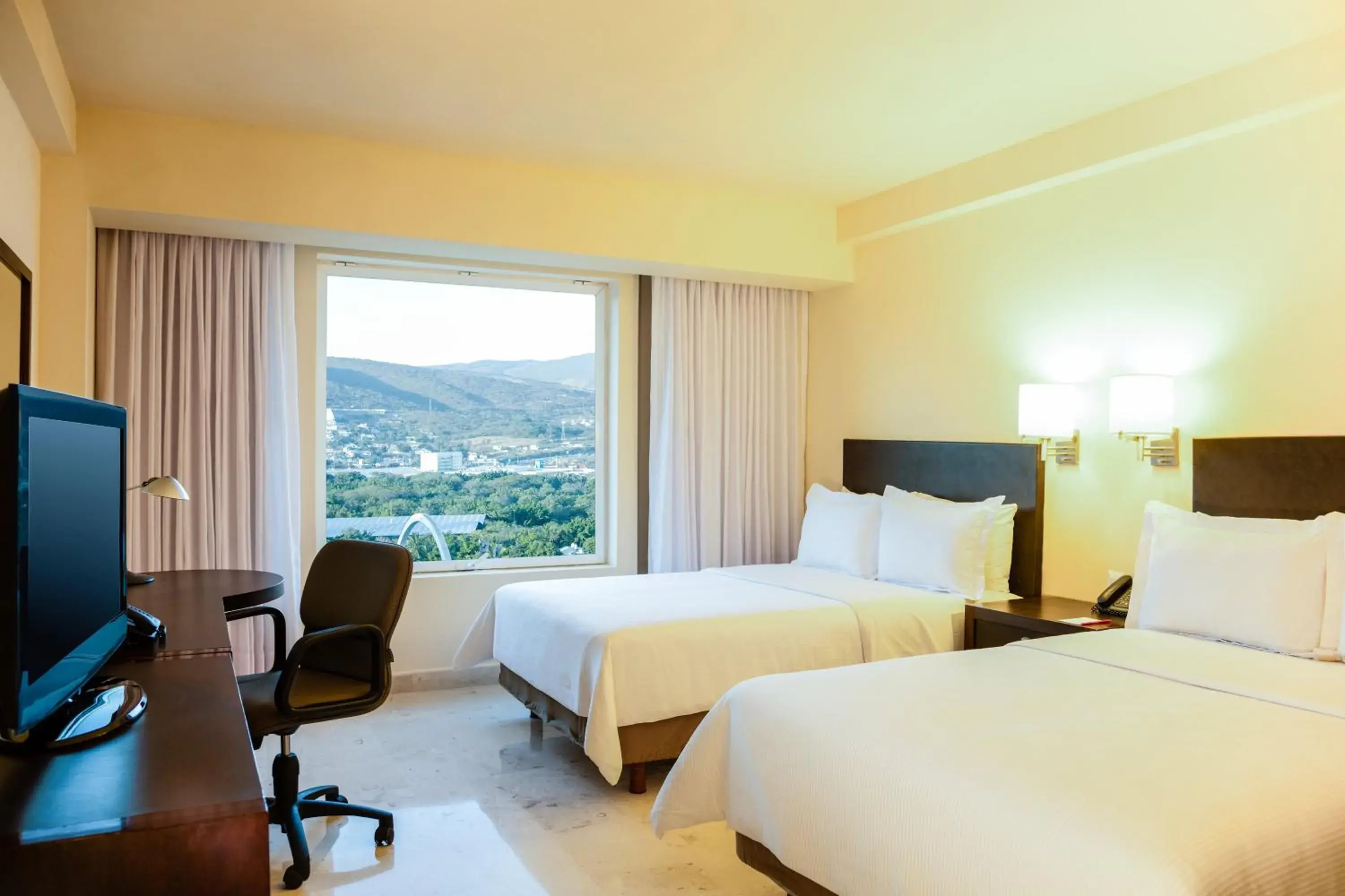 Photo of the whole room, Bed in Fiesta Inn Tuxtla Gutierrez Photo of the whole room, Bed in Fiesta Inn Tuxtla Gutierrez