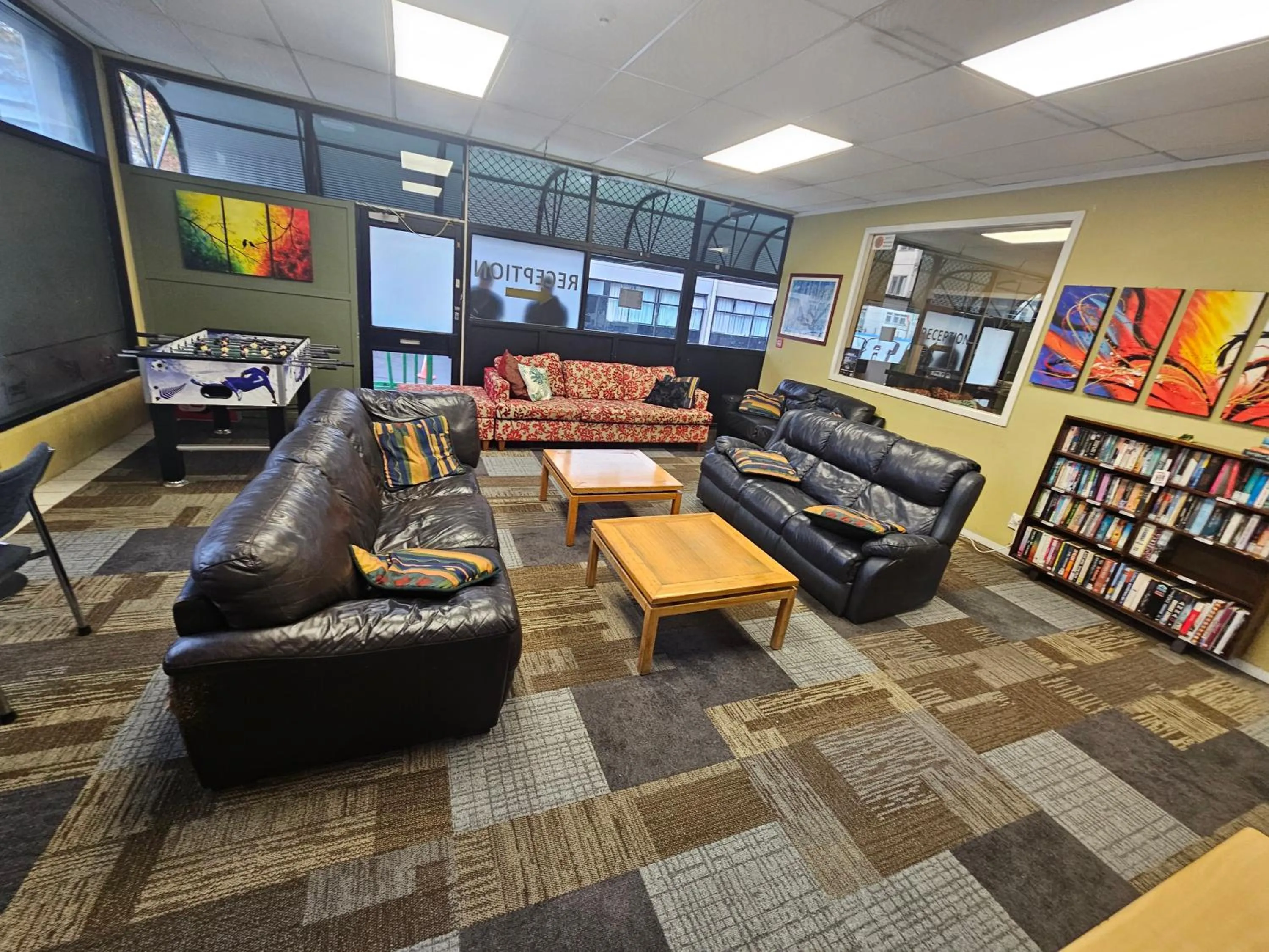 Communal lounge/ TV room in Silverfern Backpackers