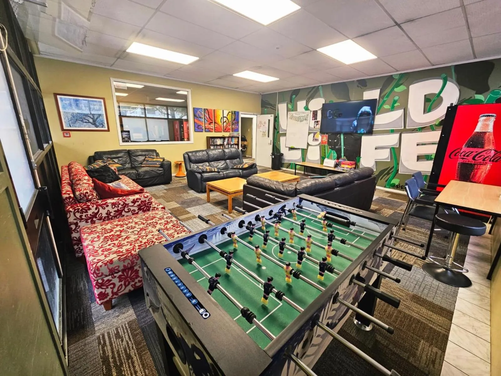 Communal lounge/ TV room in Silverfern Backpackers