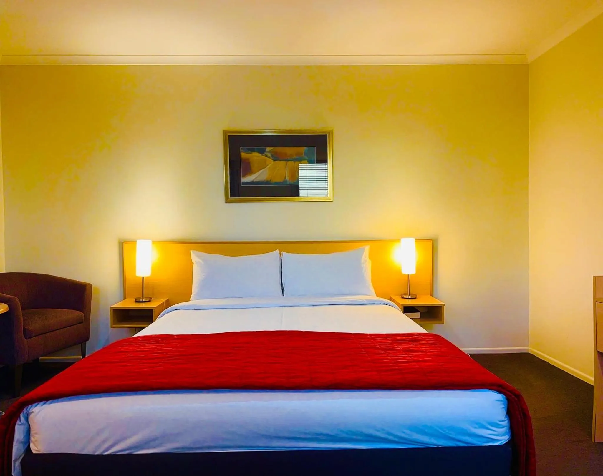 Bed in Harbour City Motor Inn & Conference