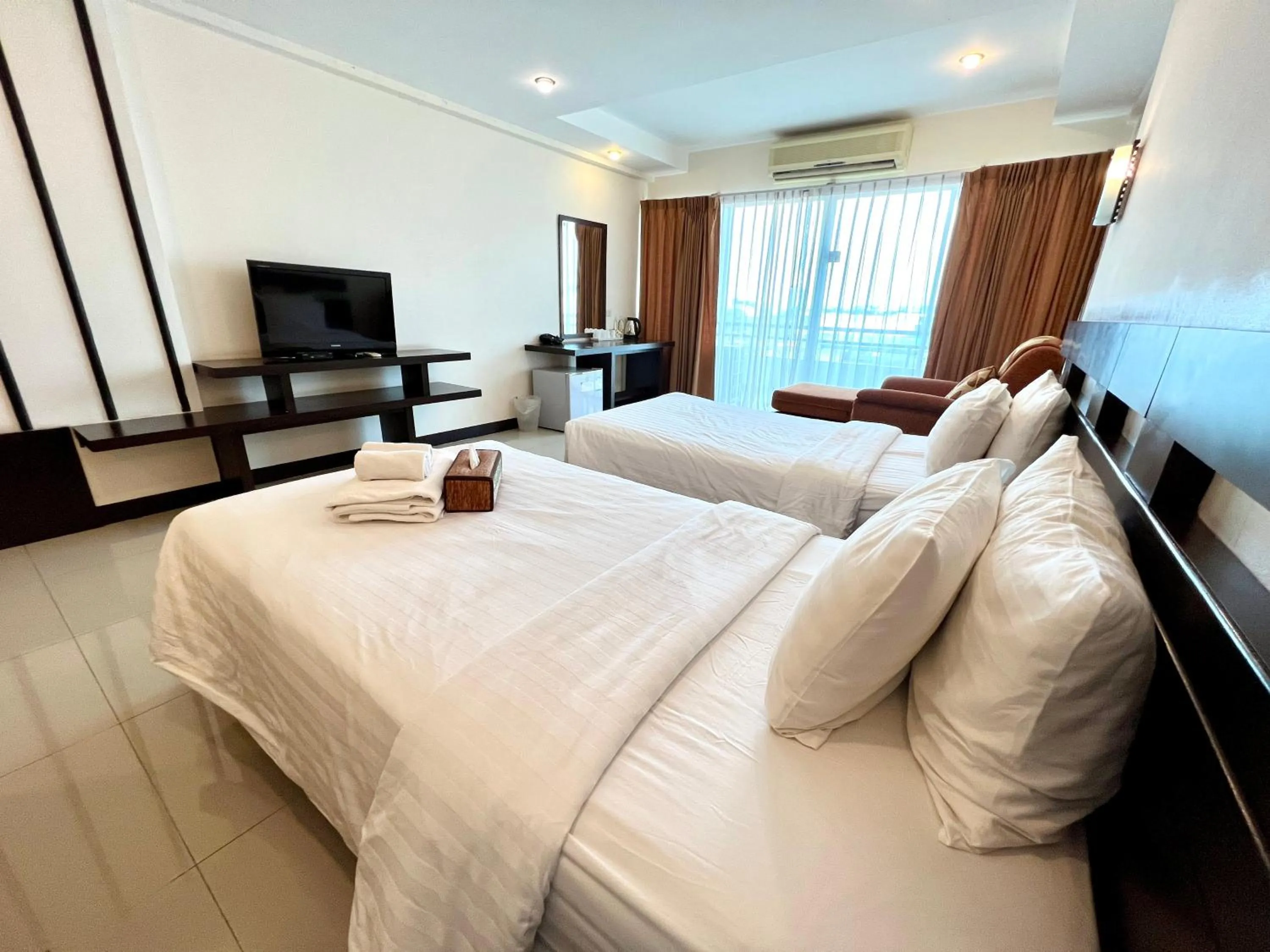 Bed in Hotel La Villa Khon Kaen