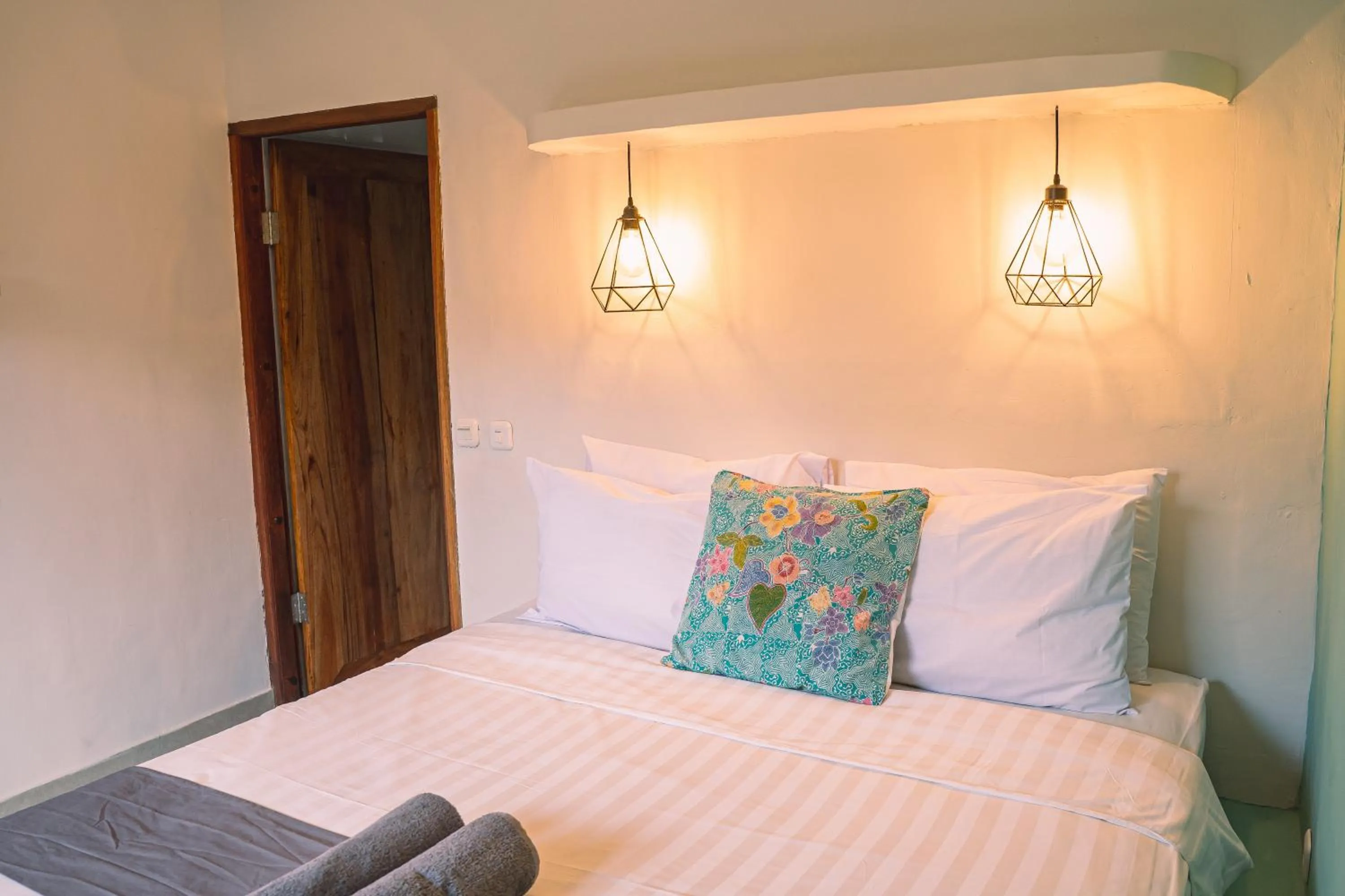 Bed in Gili Divers Hotel